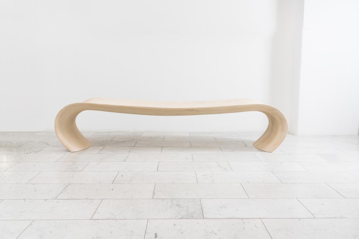 The elegance of Procario’s freeform series is translated in his bentwood posterior bench through the artist’s enduring focus on the natural beauty of his chosen material and the deliberate pressure used to exploit its inherent tensibility. As in