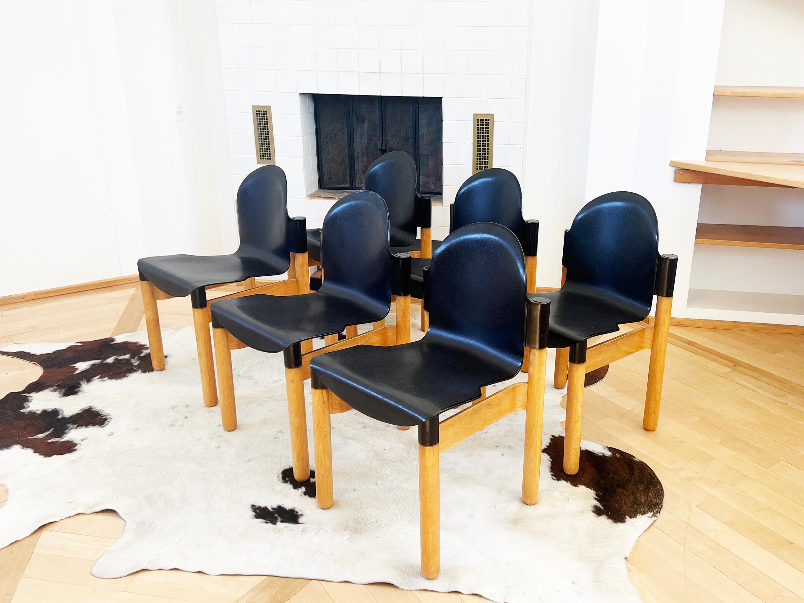 Excellent set of 6 Flex 2000 Stacking Chairs by Gerd Lange for Thonet, with wooden oak frames and black seats. No longer produced, Rare items.

Designed by Gerd Lange in 1983, manufactured in Western-Germany. The legs are made of solid ashwood, the