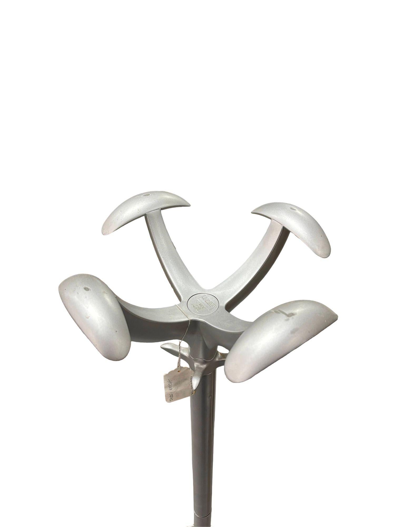 The Postmodern 1980s *Cactus* Coat Rack 1070 by Italian designer Raul Barbieri stands 65 inches tall, embodying bold, sculptural design. Its playful yet functional form features sleek lines and a striking silhouette, making it a statement piece that