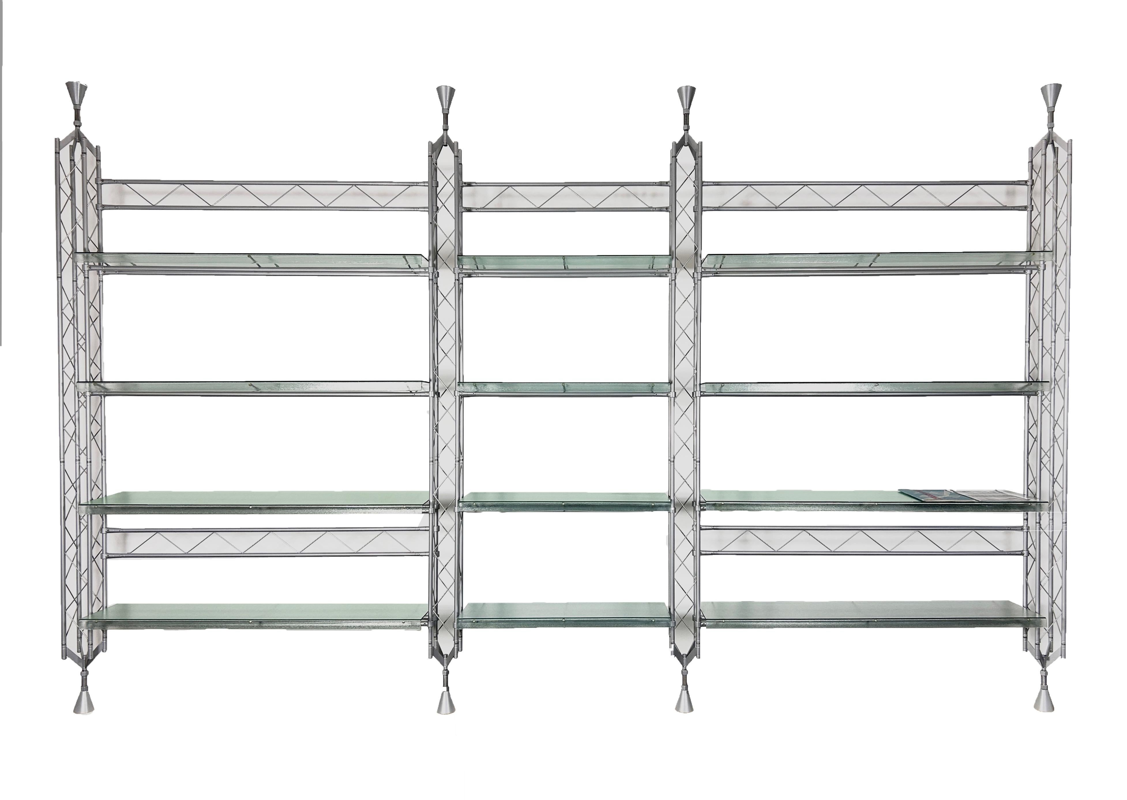 Large Post-modern Abracadabra shelf unit, Laquered Aluminum construction with u-shaped glass shelves.

designed by Italian architects De Pas, D‘Urbino &  Lomazzi (Studio DDL)

manufactured by Zerodisegnio, Italy, signed with makers embleme.

The