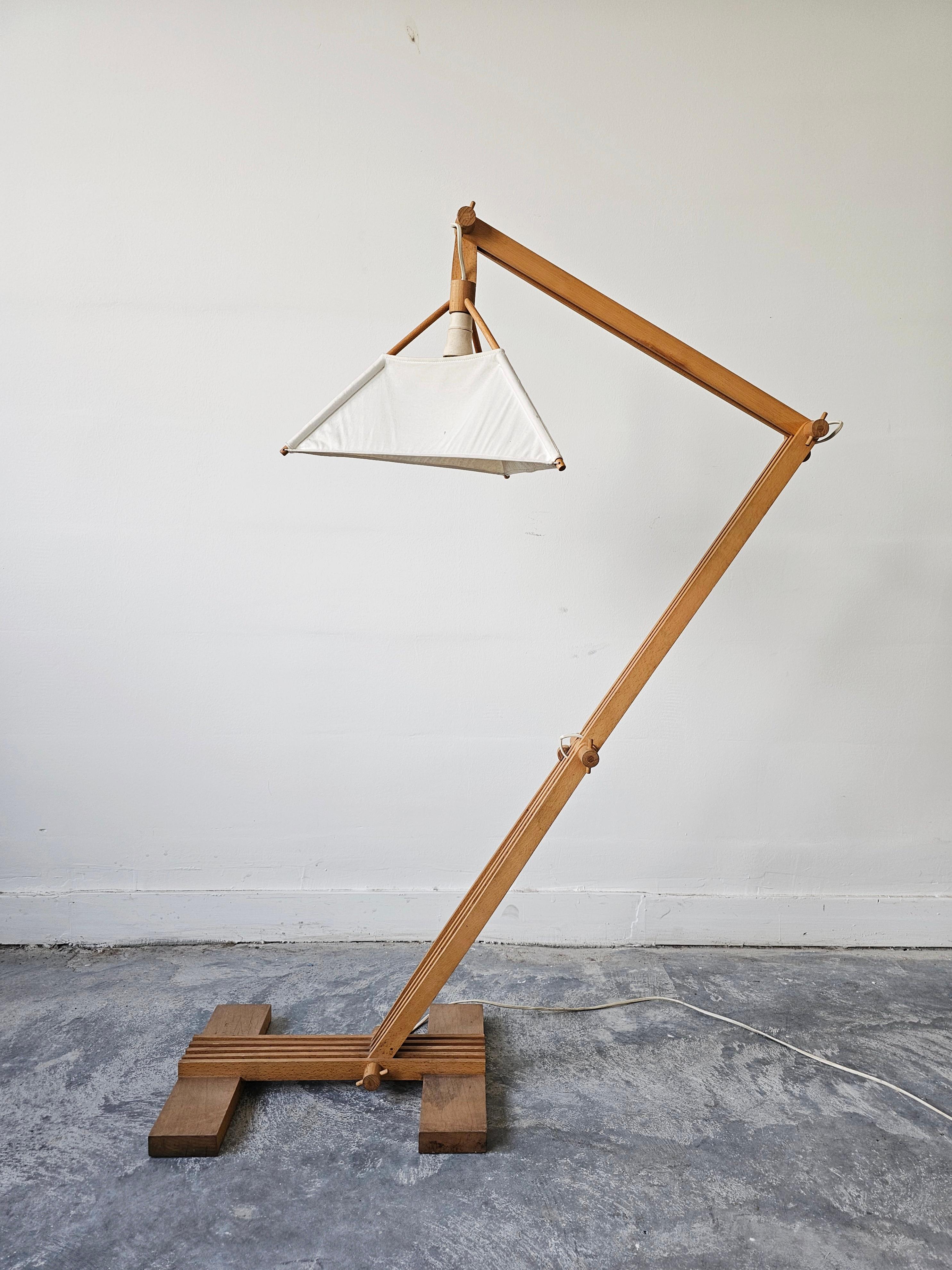 In this listing you will find a beautiful adjustable Postmodern floor lamp, made of beech wood. Design of this zig-zag lamp is made in a way to allow you to play with its shape and height thanks to simple and very effective design. Made in Germany