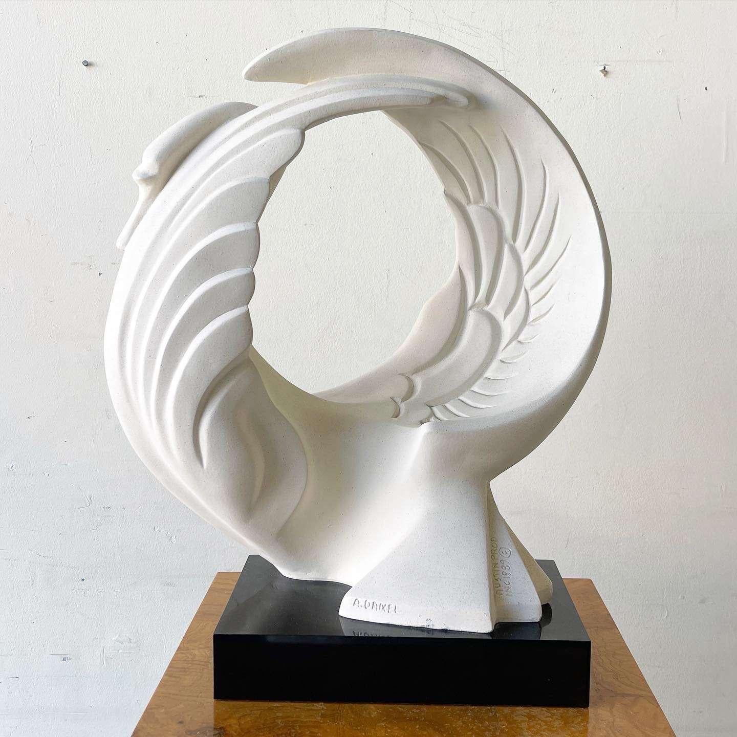 One of the Austin Productions rare items, this large curled swan is mounted to a black laminate base. Produced in limited quantities in 1989 and made by artist A. Danel.
