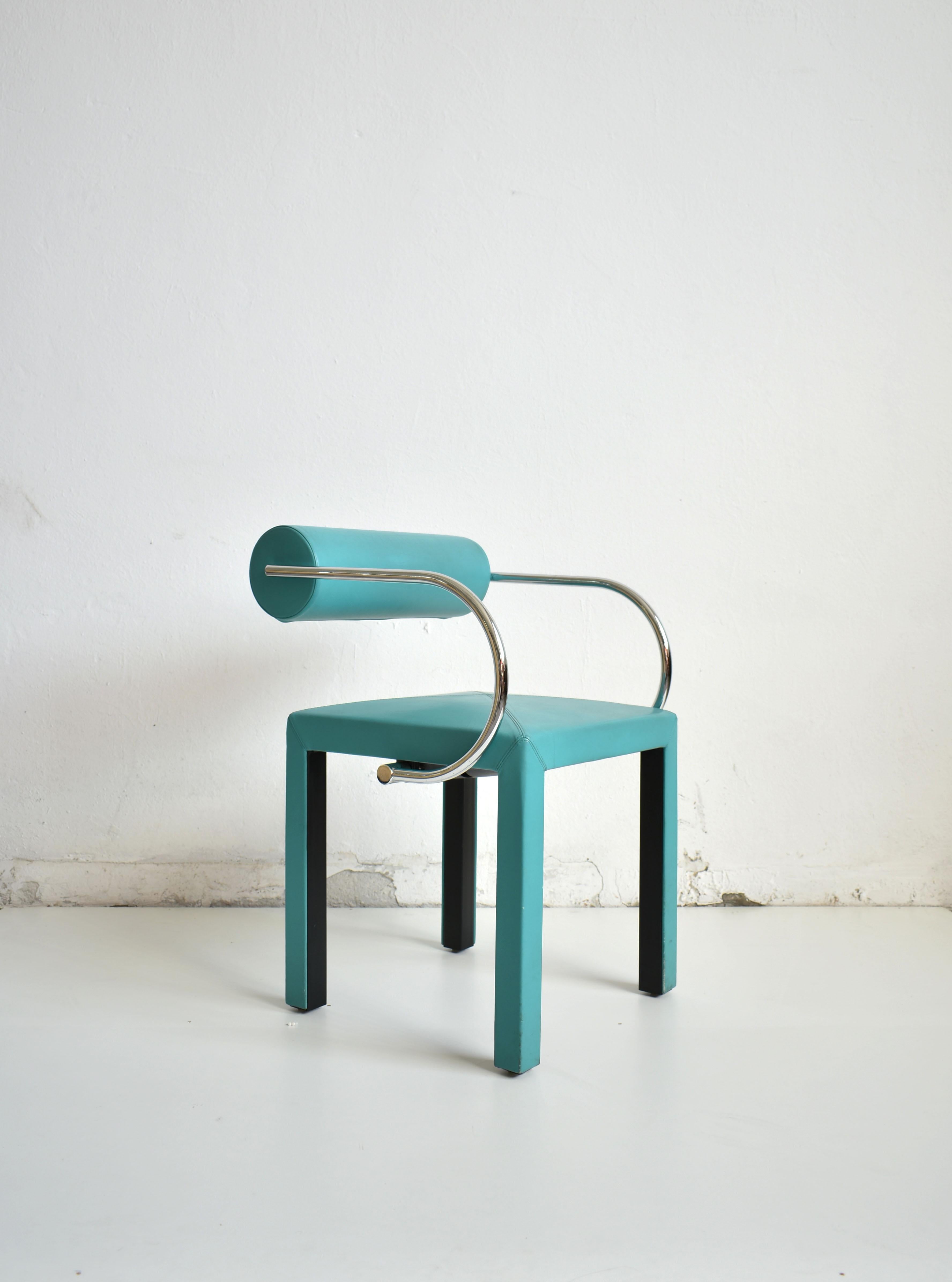 Leather 'Arconda' chair from Arcadia series
Legs, seat and the backrest are upholstered in soft, top-quality turquoise colour Italian leather. The armrest is made of chrome-plated metal. Producer's mark is visible on the bottom side of the
