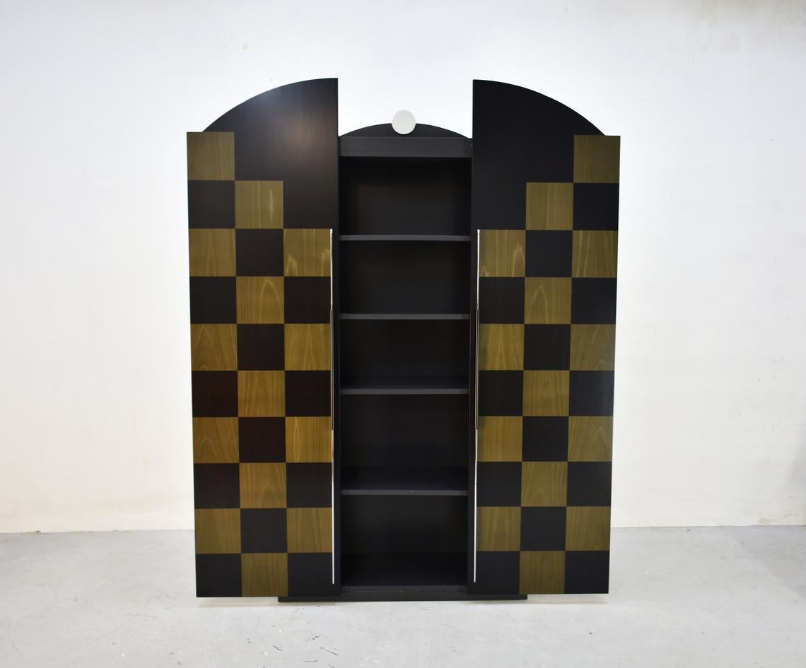 Postmodern style cabinet 'Cubic' was designed in the late 1980s by German designer Peter Maly for Munich based company Reim Interline

This high-end cabinet was part of the 'Facades' series that consisted of five different models of