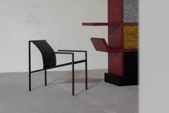 Postmodern armchair in folded metal Italy 1980s