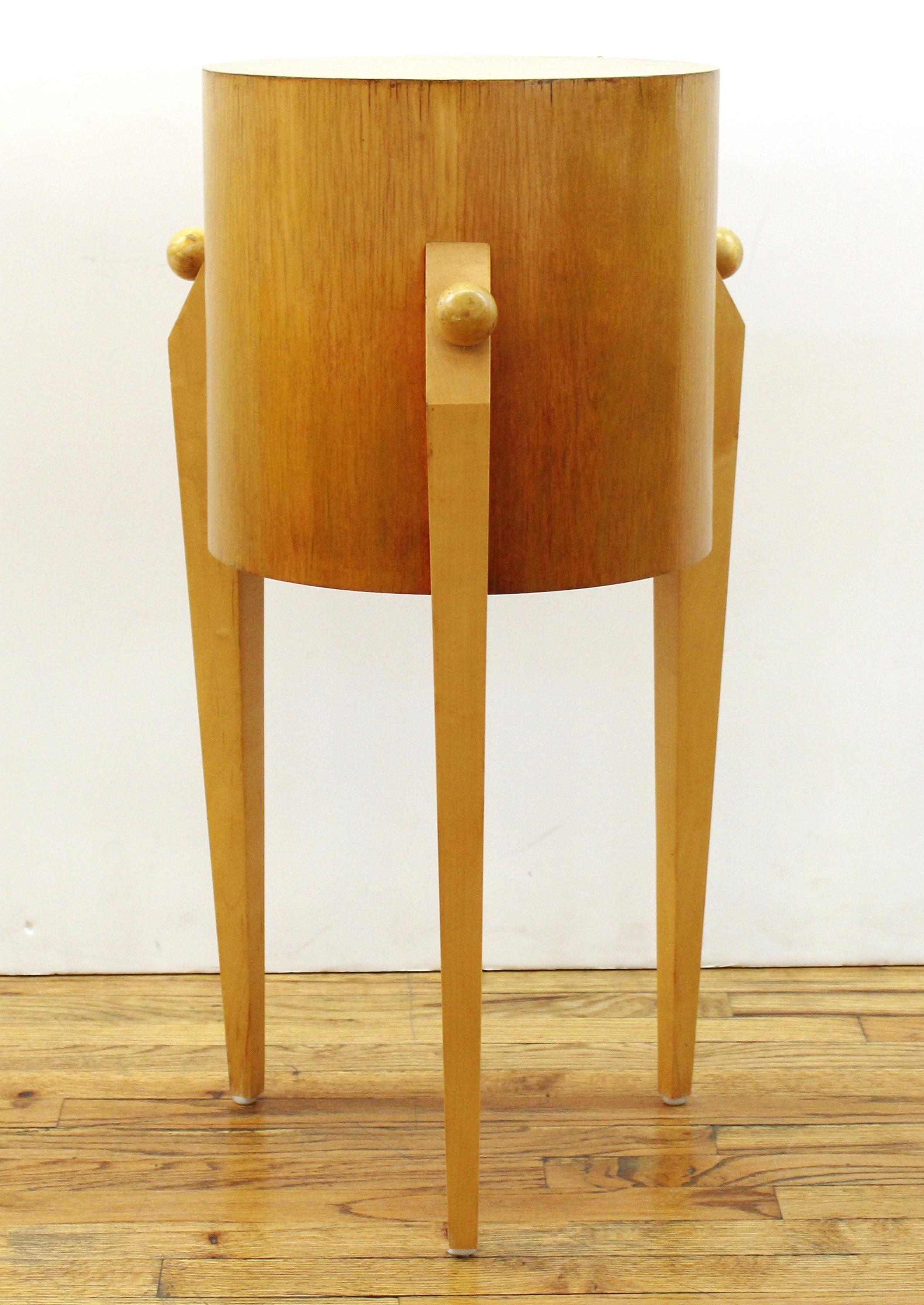 Postmodern Art Deco style tripod display pedestal in wood, unmarked, circa 1990s. Measures: 30.25