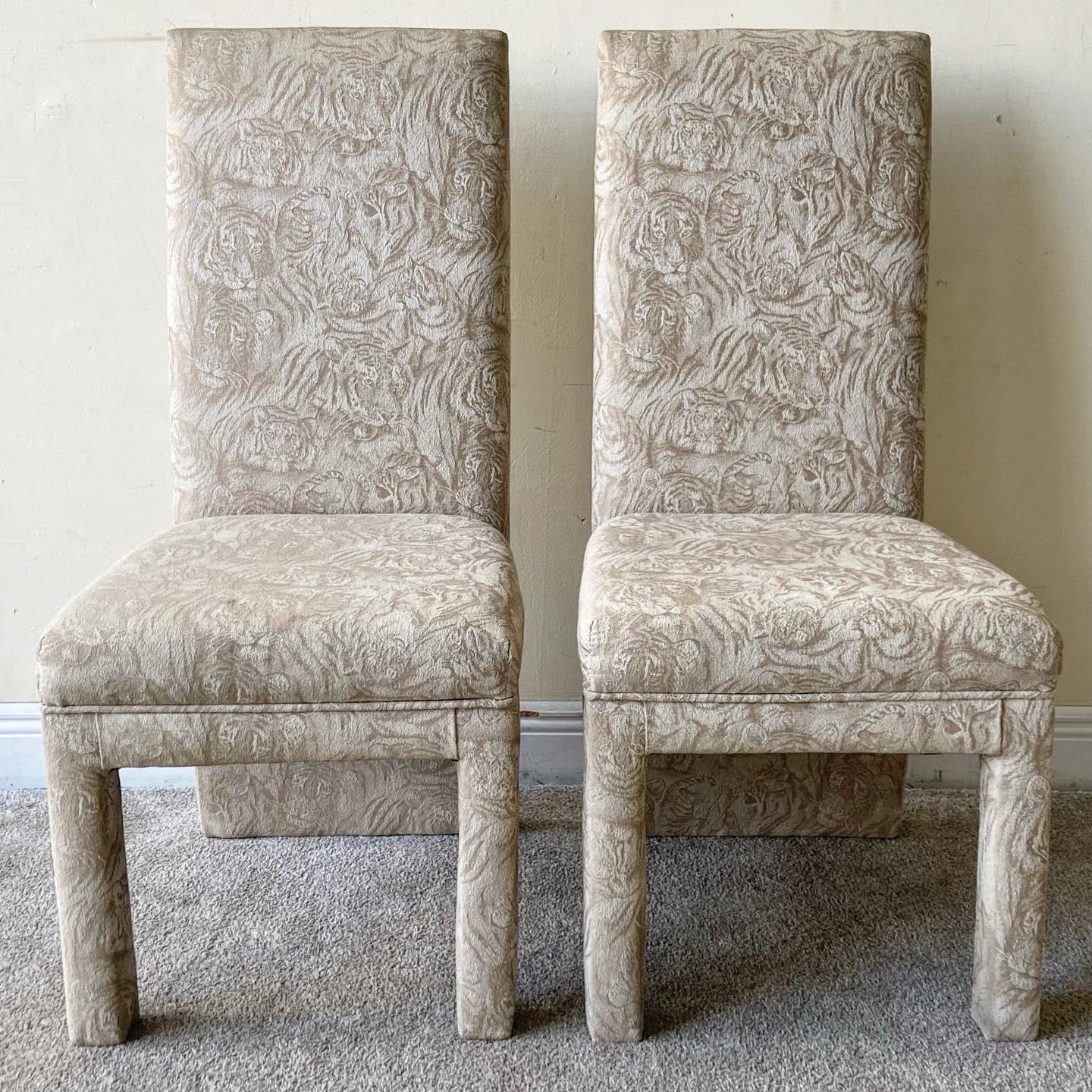 Incredible set of 4 parsons dining chairs. Each chair features an amazing beige fabric with tiger faces tessellating the surface of the chairs. Seat Height: 18.0 in