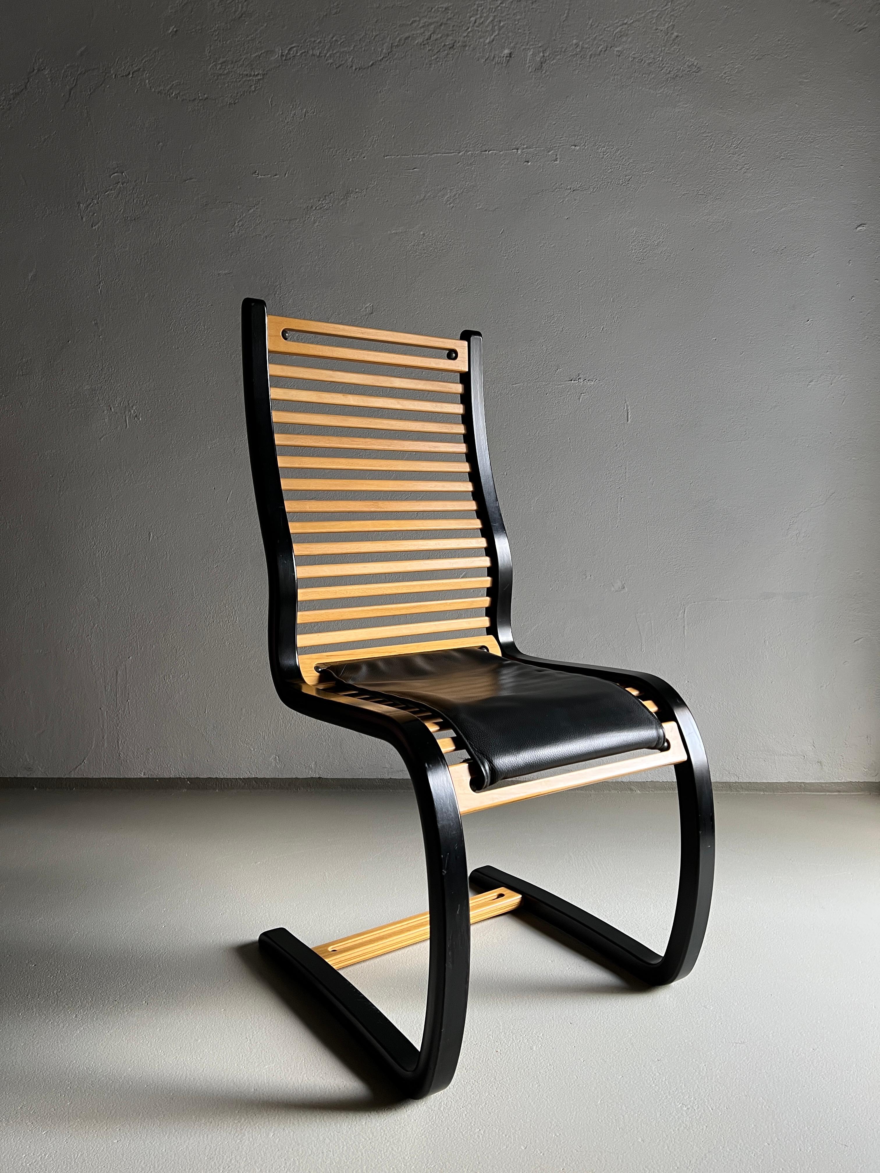 This “Spring“ chair was designed by Terje Hope in 1984 and produced by Møremøbler A / S. It’s made of laminated wood with an anatomical shape, zip leather seat cushion included. Minimalist design with big attention to detail. There’re rubber lines