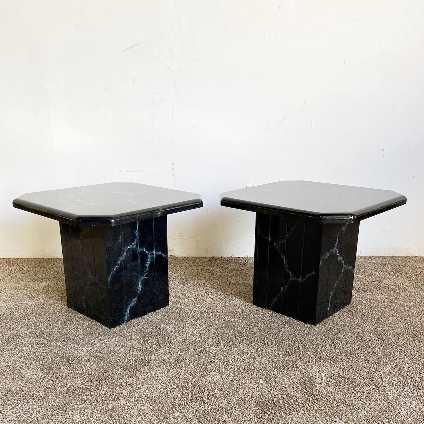 Elevate your space with the wonderful vintage postmodern pair of mushroom side tables. Each table features a black faux marble finish over wood, adding a touch of sophistication and style to your room.

Wonderful vintage postmodern pair of mushroom