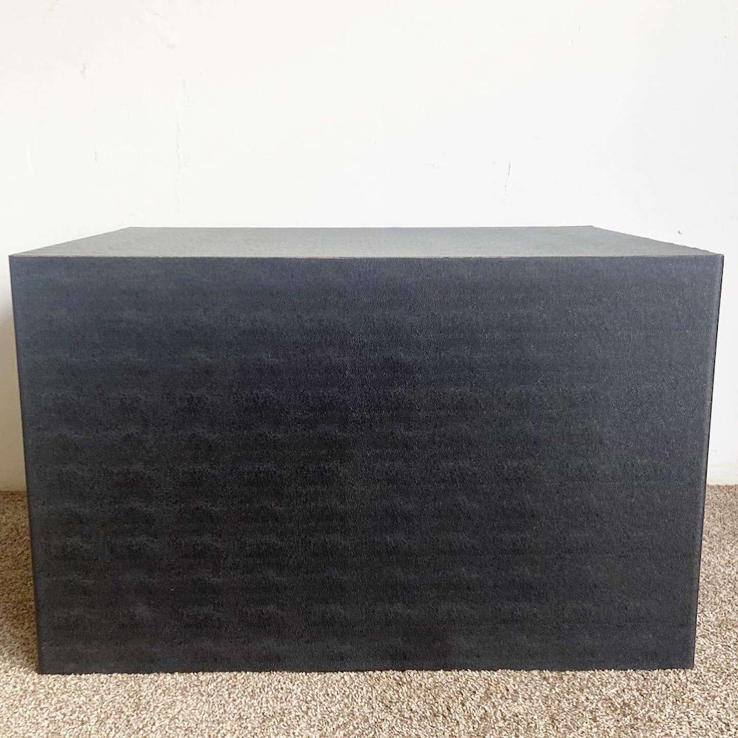 Exceptional vintage postmodern oversized cubic table. Features a black faux snake skin.
