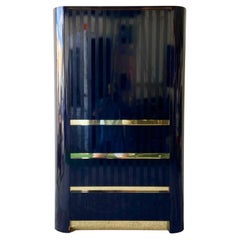 Postmodern Black Gloss and Matte Striped Laminate Armoire with Gold Paneling