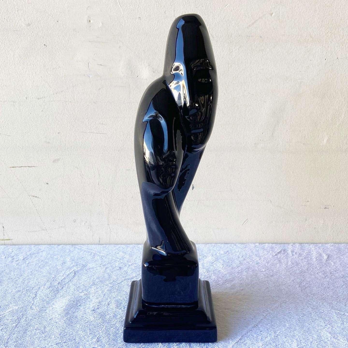 Américain Sculpture postmoderne à deux têtes en céramique noire brillante en vente