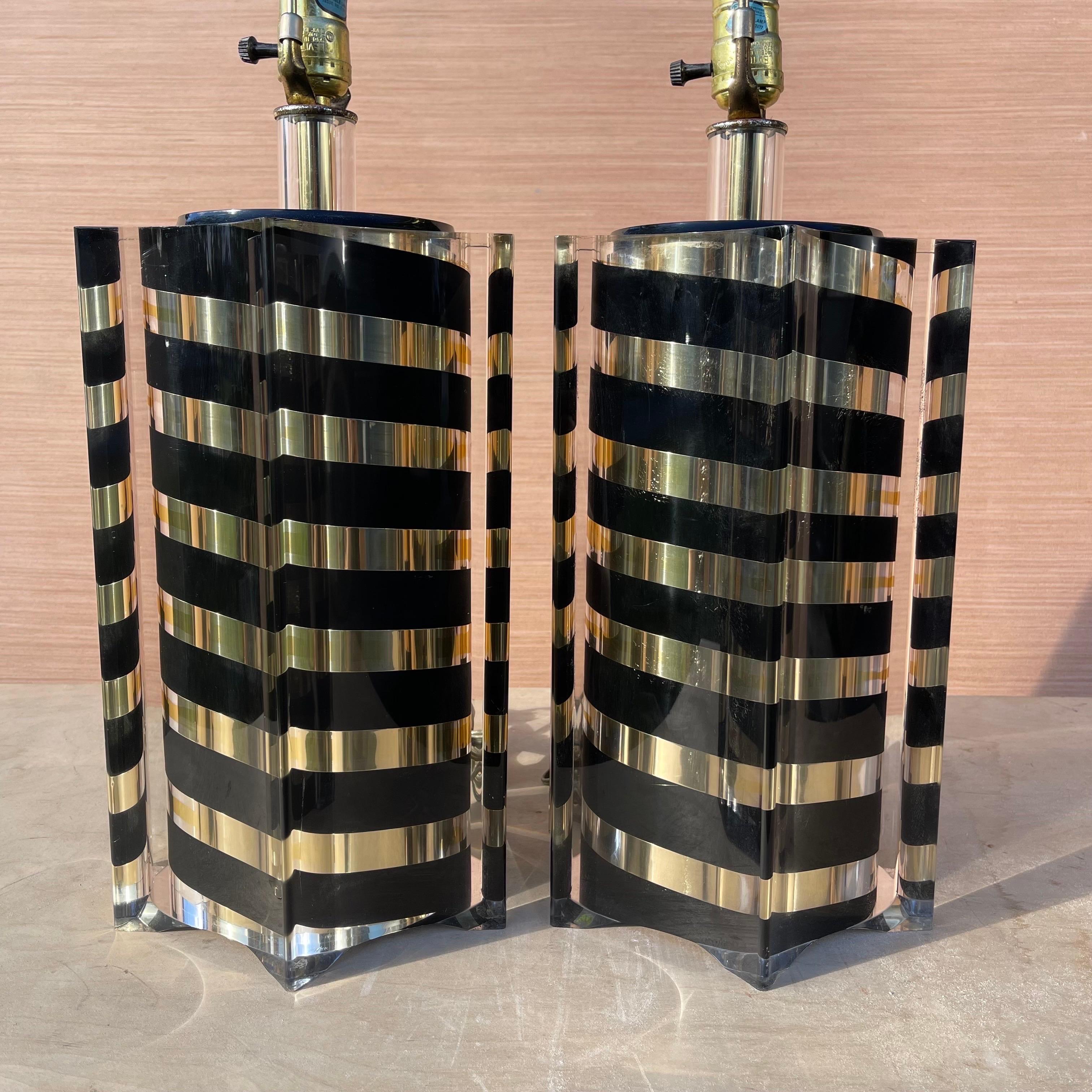 Fabulous pair of black and gold striped lucite lamps, made in Italy by Smart Italia Roma.