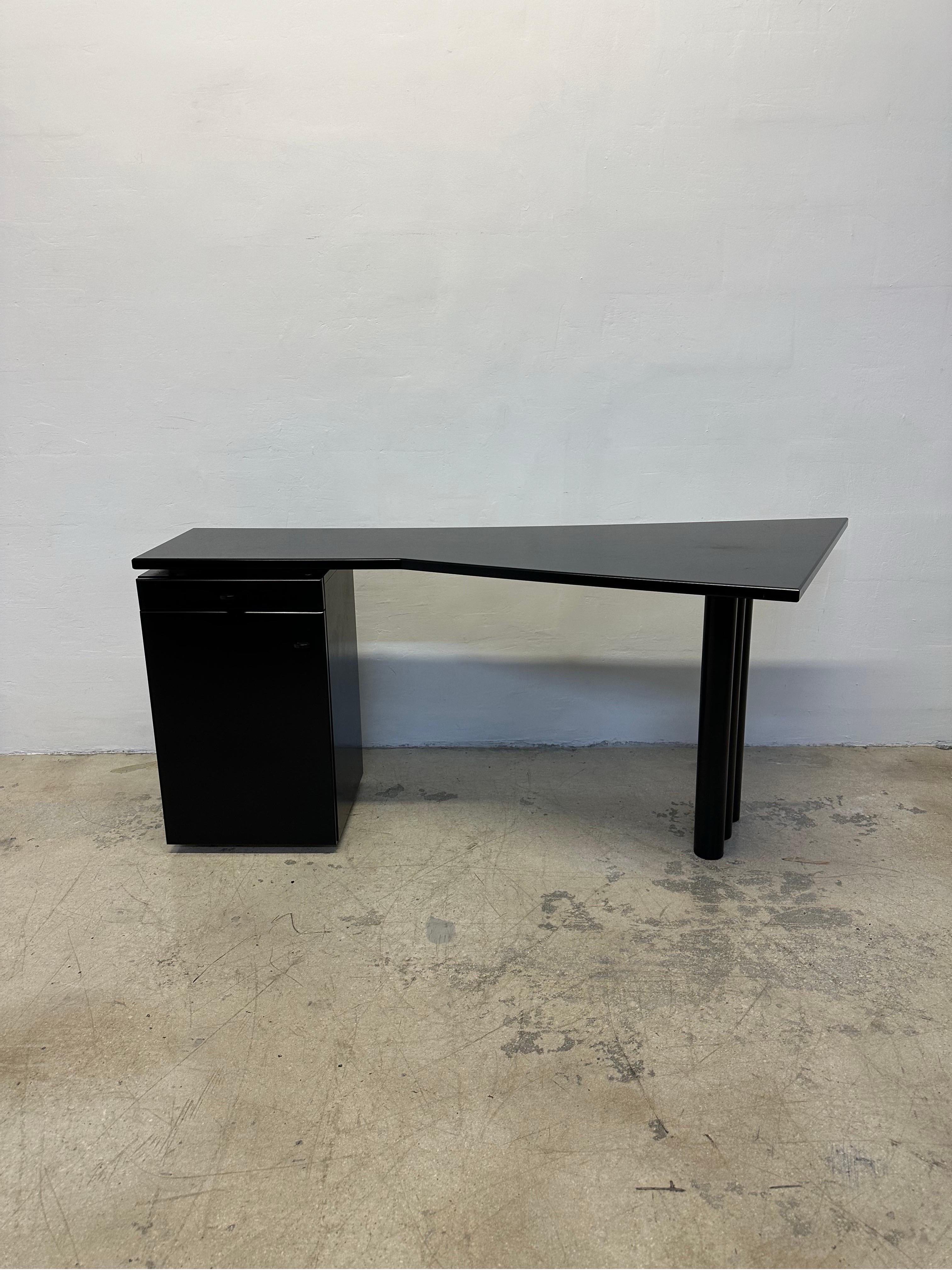 All black lacquered postmodern writing desk with a storage cabinet and drawer with organizer by Interlubke, Germany 1980s.