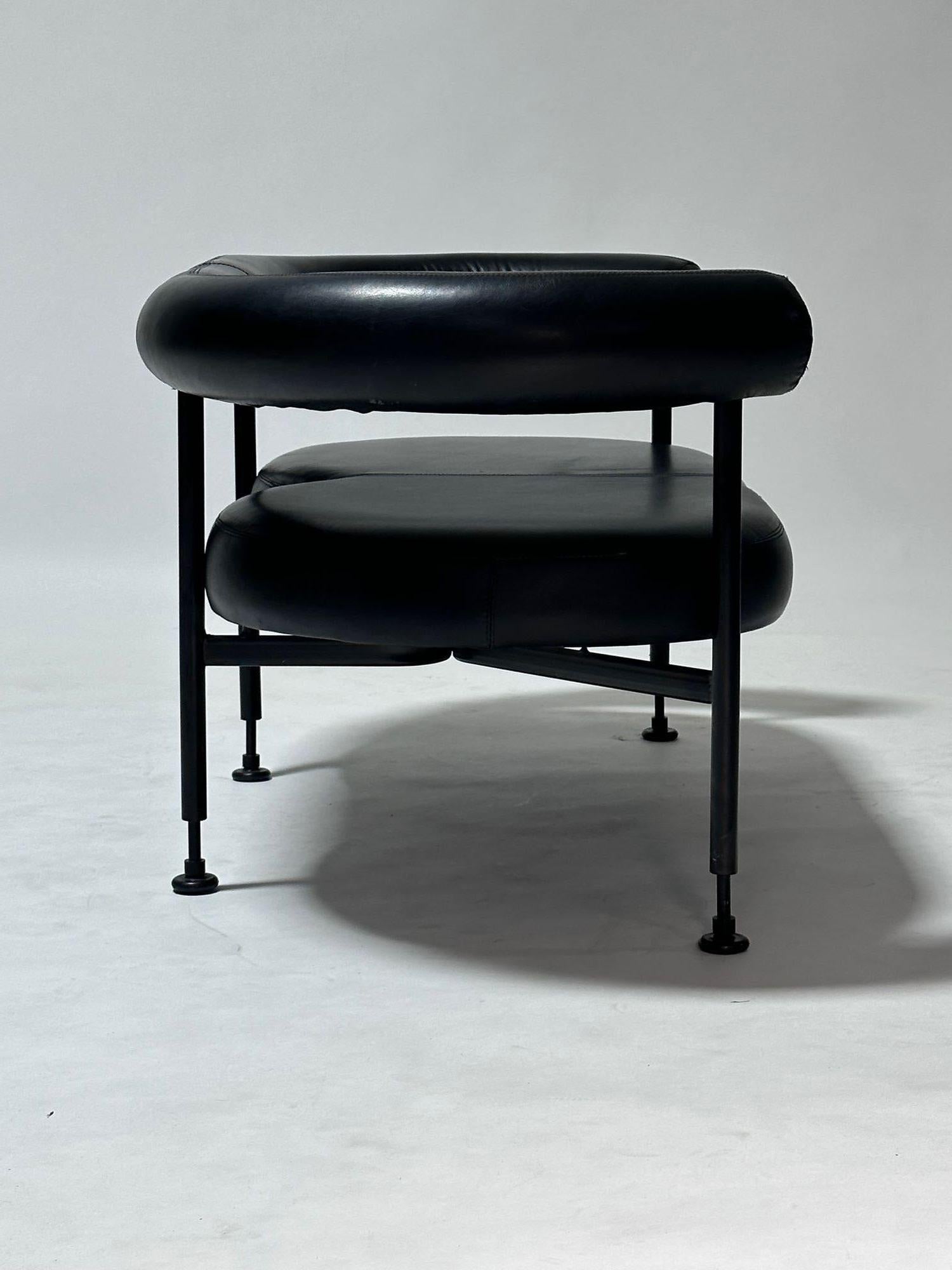 Postmodern Black Leather and Steel Settee Bench, 1980. Settee has wrap around arms with original leather.

