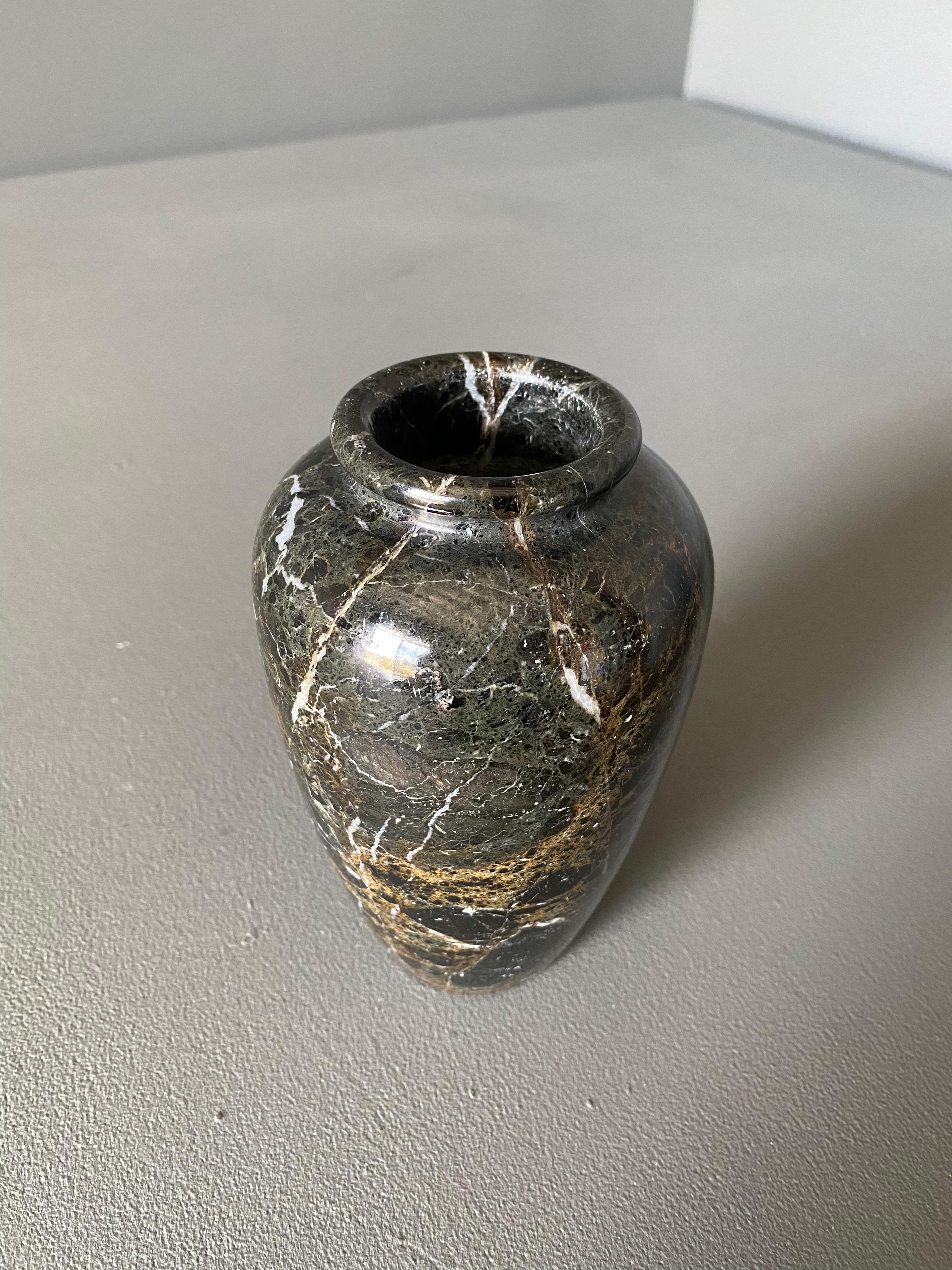 Postmodern black marble urn form vase, circa 1980.