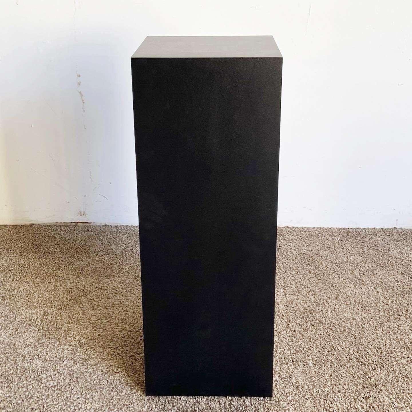 Another amazing postmodern vintage pedestal. Features a matte black laminate!