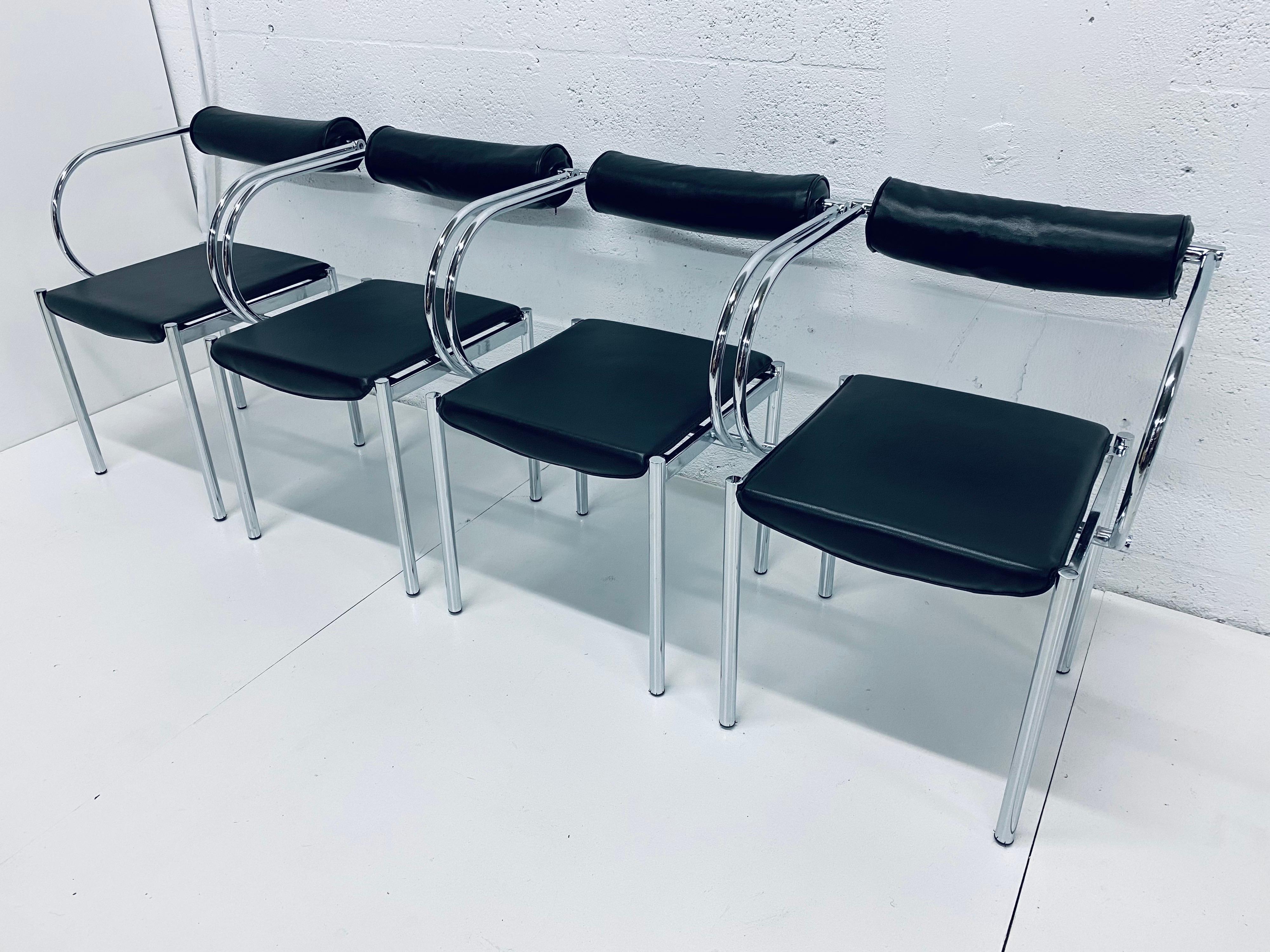 Postmodern design chairs with black Naugahyde seat and foam back on a polished chrome tubular frame. Manufacturer unknown.