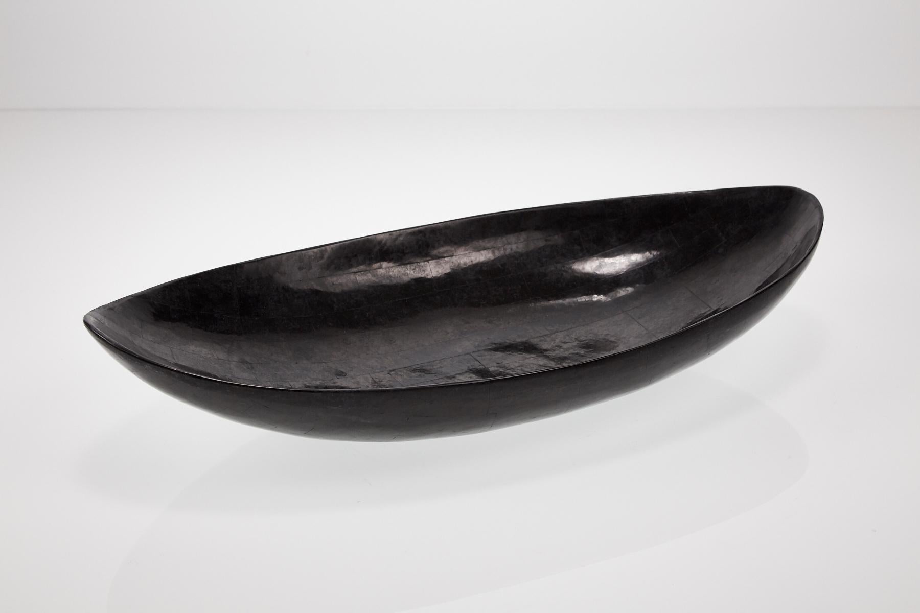 Decorative low bowl or platter hand-inlaid with black stone. Set upon small raised base.

All furnishings are made from 100% natural Fossil Stone or Seashell inlay, carefully hand cut and crafted piece-by-piece and precisely inlaid to the form of
