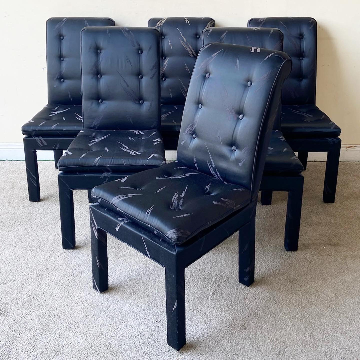 Amazing set of 6 postmodern parsons chairs. Each feature a black on black fabric with tufted back rests.
 