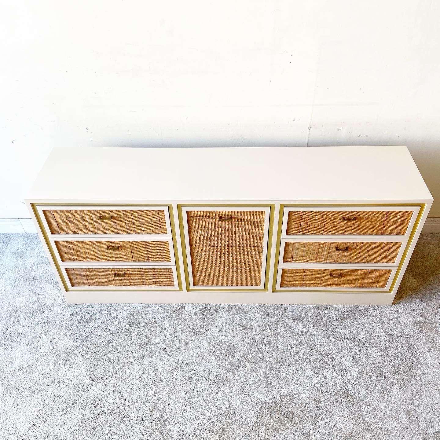 Incredible boho chic meets postmodern dresser celebrating the essence of south Florida. Features a cream lacquer laminate with wicker drawer faces and on the cabinet door as well. Made in Miami by Grant and Sloan Inc.
