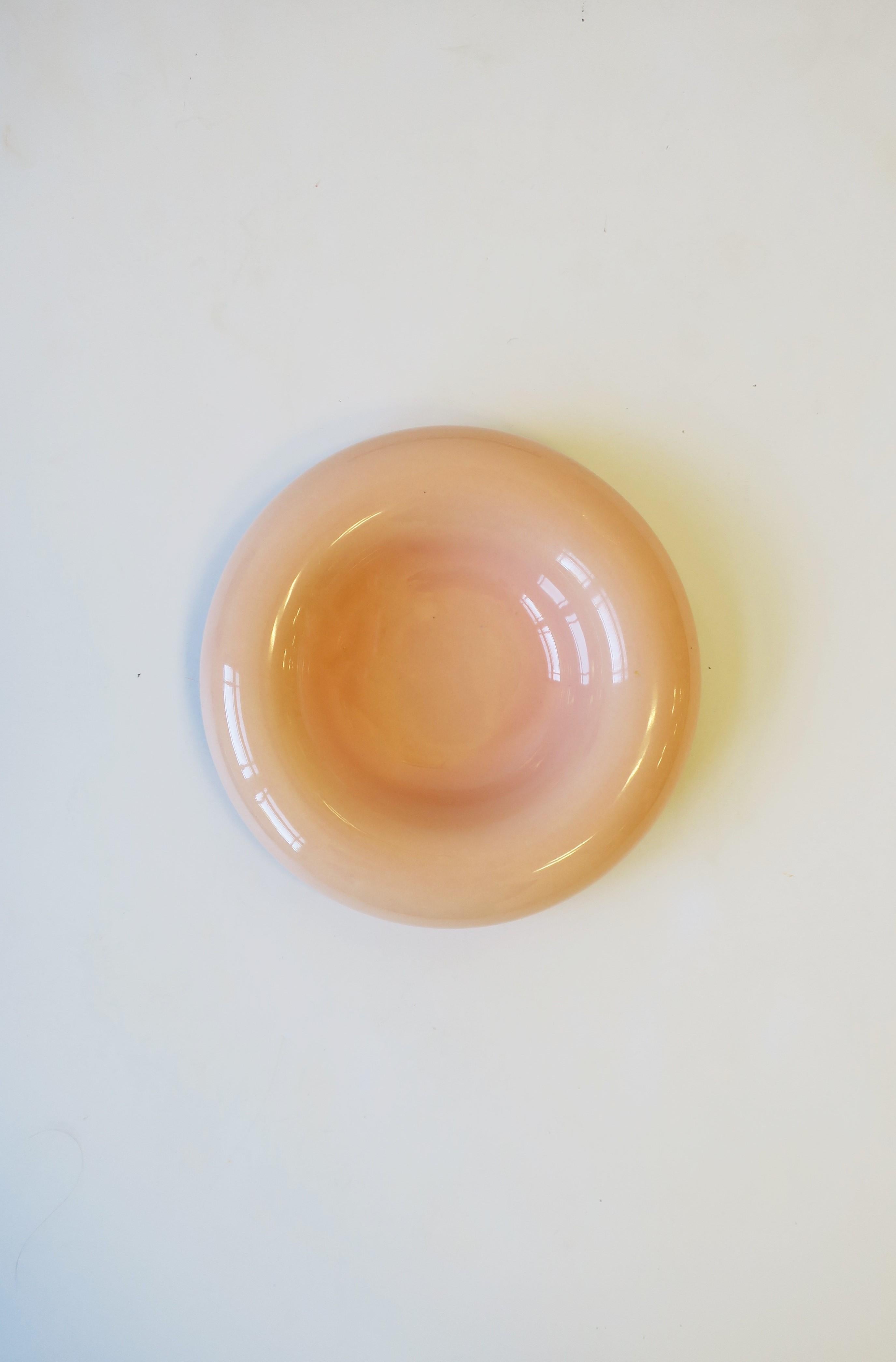 A Modern style or Postmodern period high-gloss lite-peach round ceramic bowl, circa 1980s. Bowl measures: 7