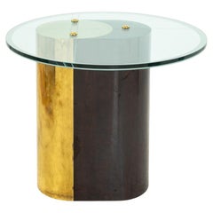 Mesa postmoderna de latón y madera ebonizada
