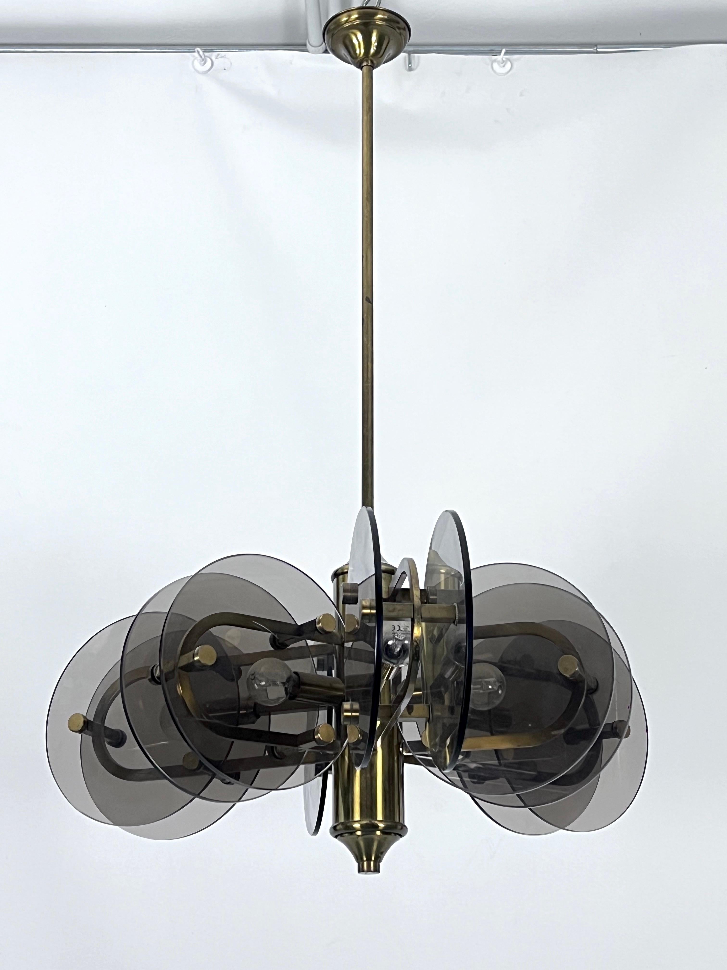 Italian Postmodern brass and thick glass chandelier by Gino Paroldo. Italy 1970s For Sale