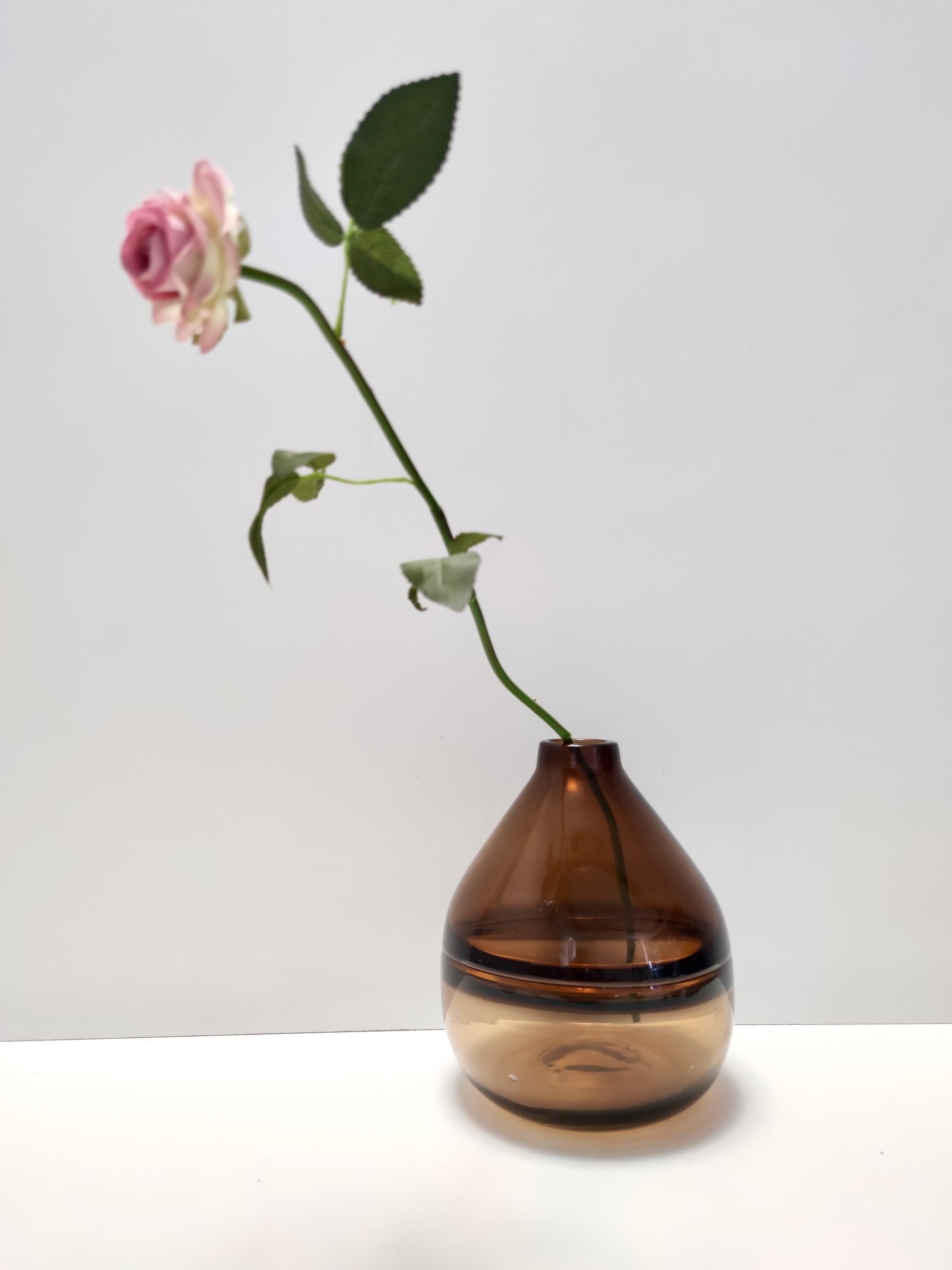 Made in Italy, 1970s-1980s. 
This vase is made in incalmo Murano glass, which has been hand blown with two different shades of brown.
It is a vintage item, therefore it might show slight traces of use, but it can be considered as in excellent