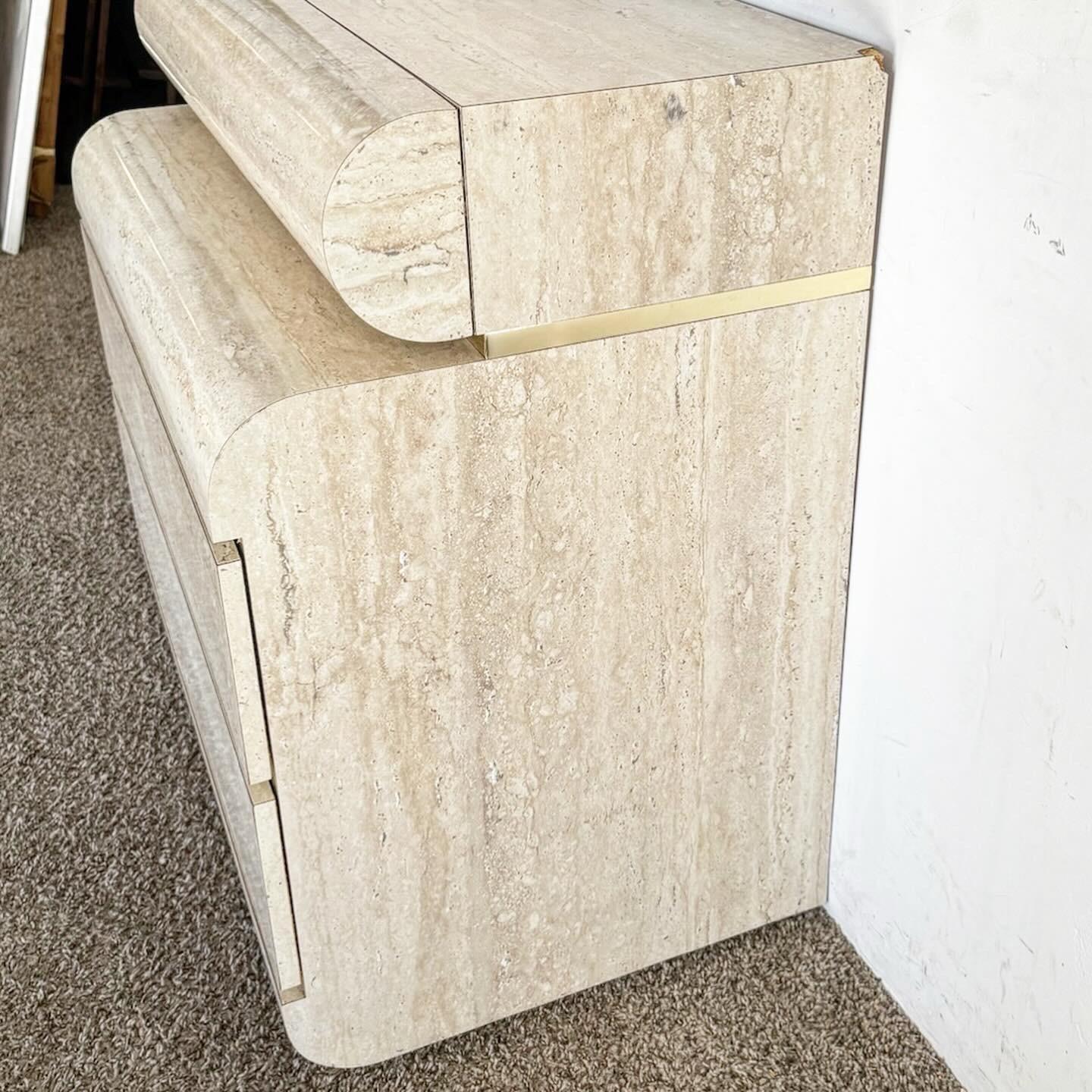 The Postmodern Bullnose Faux Travertine Laminate Chest of Drawers offers a blend of modern sophistication and functionality. Its sleek postmodern design, featuring smooth bullnose edges and luxurious faux travertine laminate, adds elegance to any