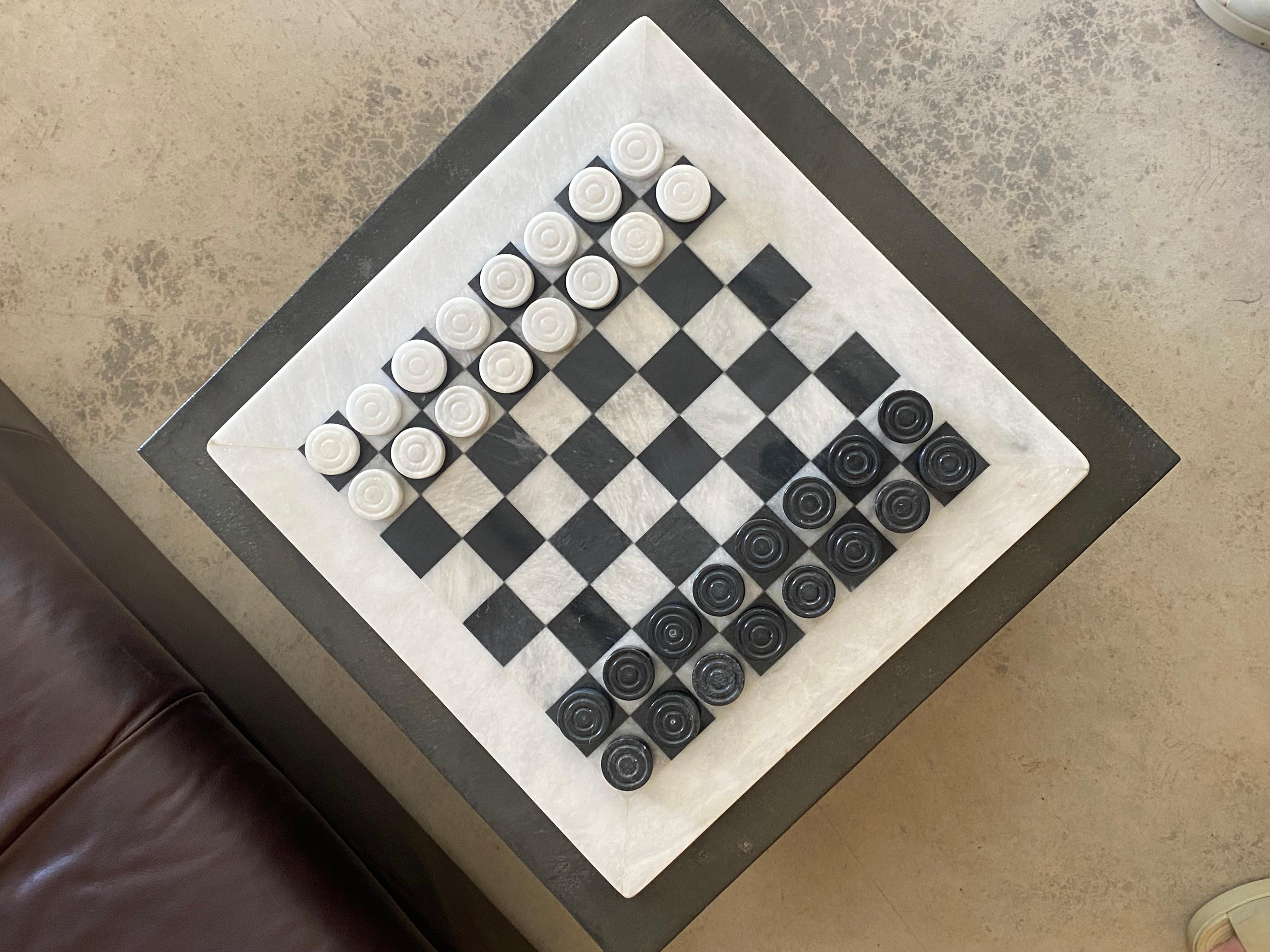 Postmodern Minimalist carved marble checkers game board with short 
