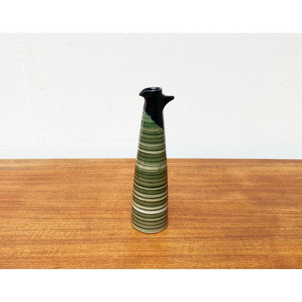 Postmodern Ceramic Carafe Vase by JS for Mobach, in Very Good conditions. Designed 1980 to 1989

Additional information:
Materials: Ceramic
Color: Black
Styles: Postmodern
Item Type: Vintage, Antique or Pre-owned
Diamension: 2.76ʺW × 2.76ʺD ×