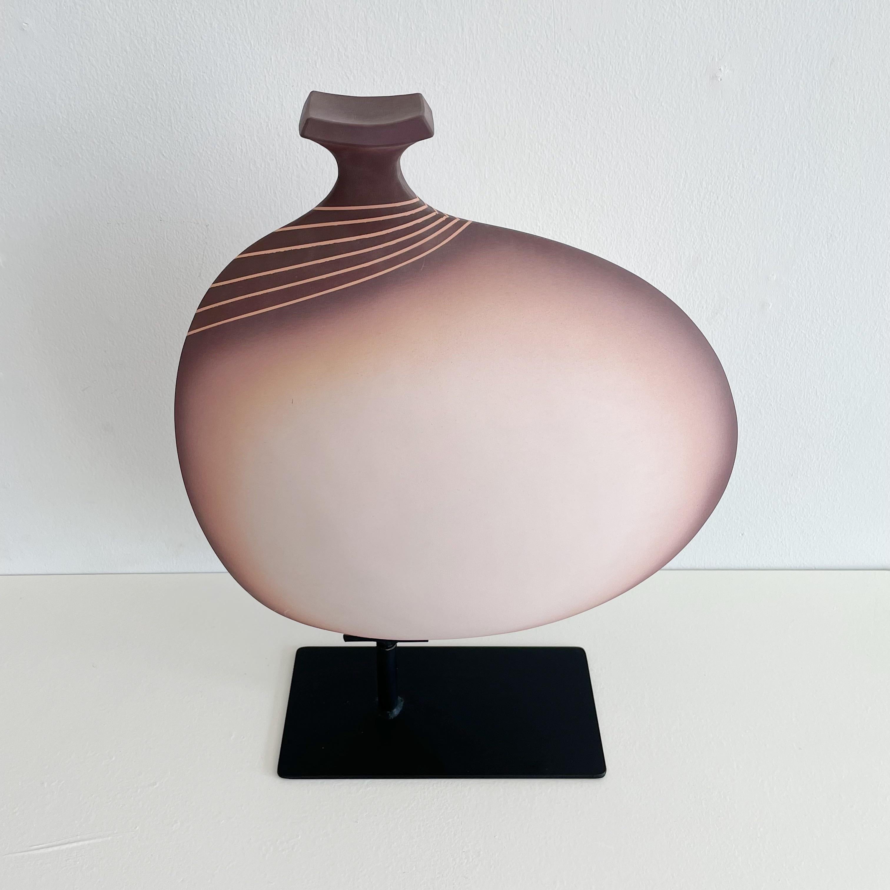 Carolyn Sale abstract postmodern airbrushed ceramic sculpture on black steel base. Signed. 1980s. California. This is a decorative vase sculpture and not a functional vessel as there are no openings.