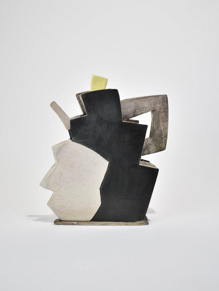 Sculptural postmodern ceramic teapot sculpture in black and white with a neon yellow stopper. Recommended for display use only. Signed on base.