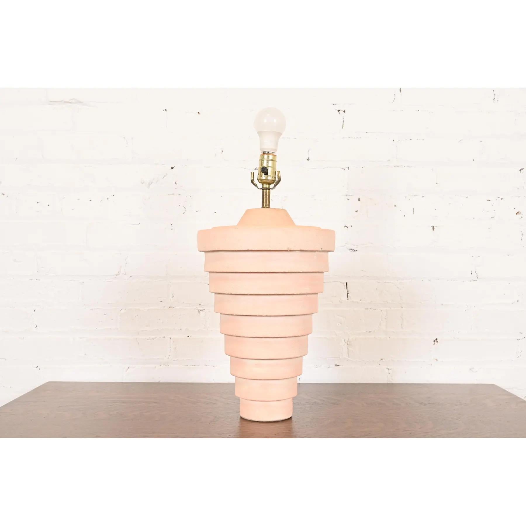 A beautiful Postmodern ceramic tiered table lamp

USA, Late 20th Century

Measures: 10
