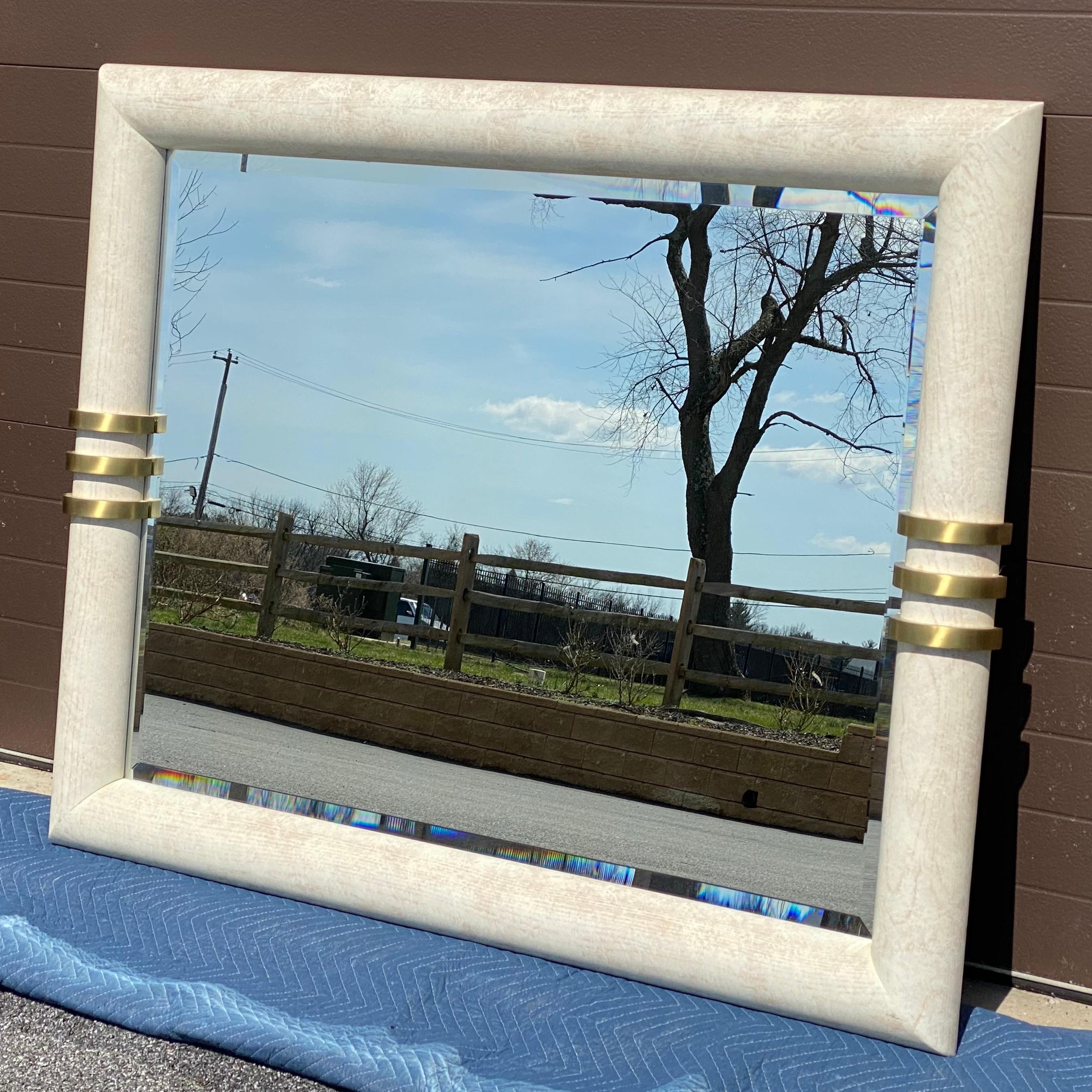 An epic modernist wall mirror featuring an cerused oak bullnose frame with brass details and beveled glass. Mirror view 46”w 35”h.
Could also be used vertically.