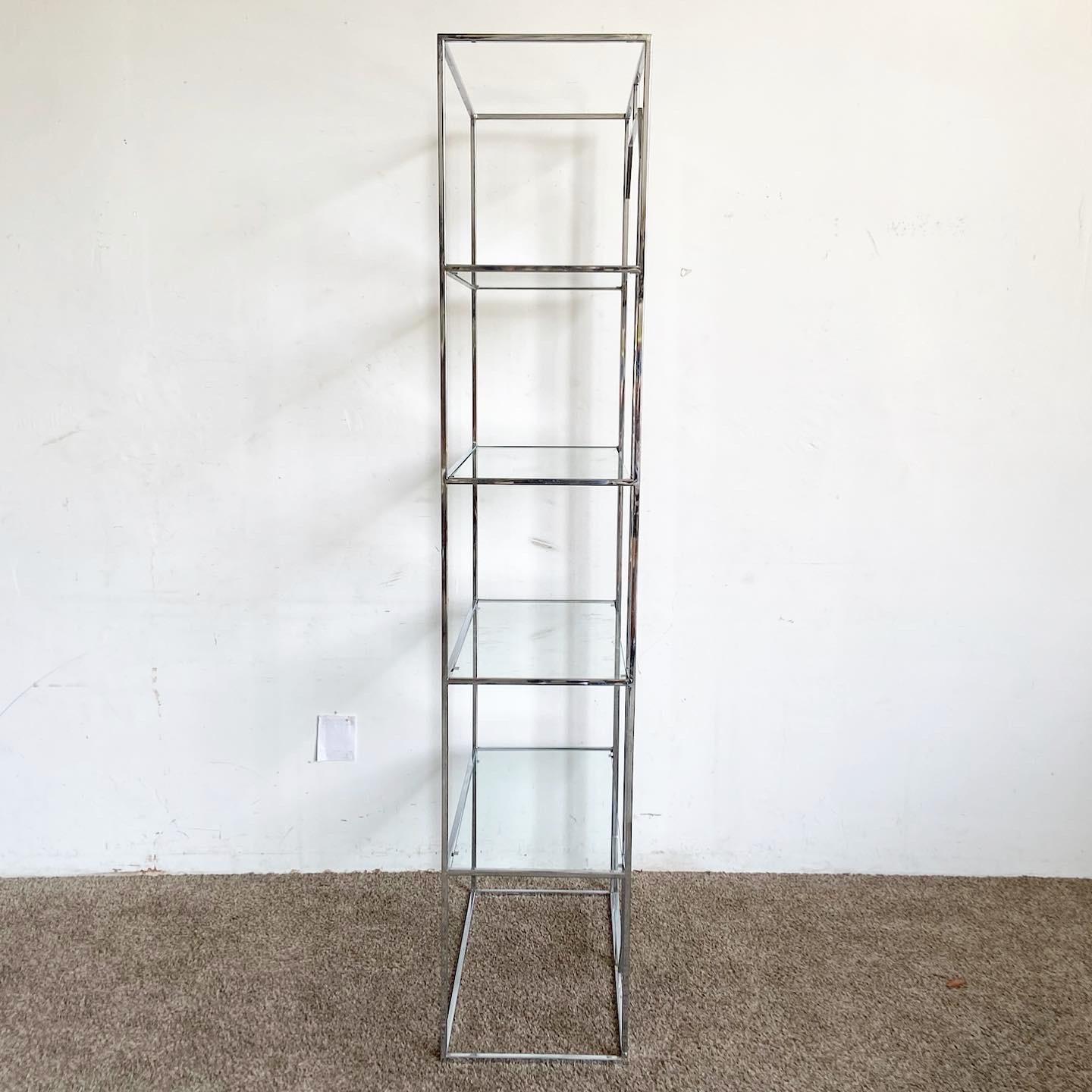 Elevate your space with this Postmodern Chrome Glass 4-Shelf Etagere. With its sleek chrome frame and transparent glass shelves, this unit is a perfect blend of form and function. Ideal for various settings, it offers ample display space without