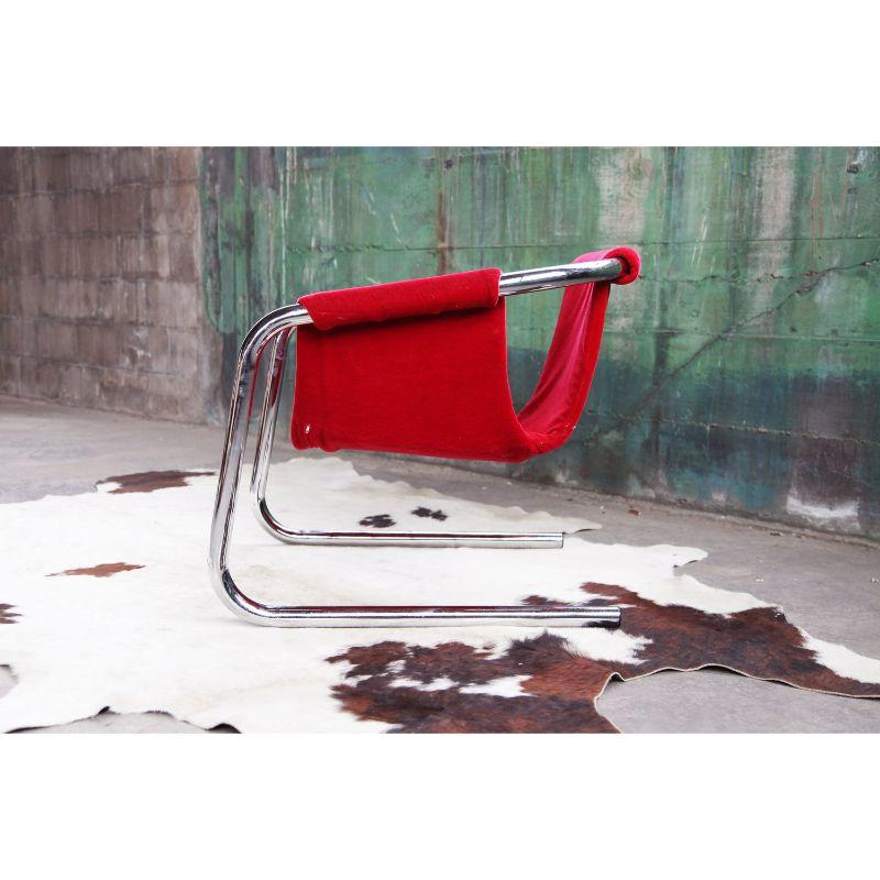 Stunning, and very rare, substantial Postmodern sling Vecta Zermatt lounge chair designed by Duncan Burke and Gunter Eberle for Vecta Group and manufactured in Italy. We have one chair available in red velvet. This is a Very stylish post modern