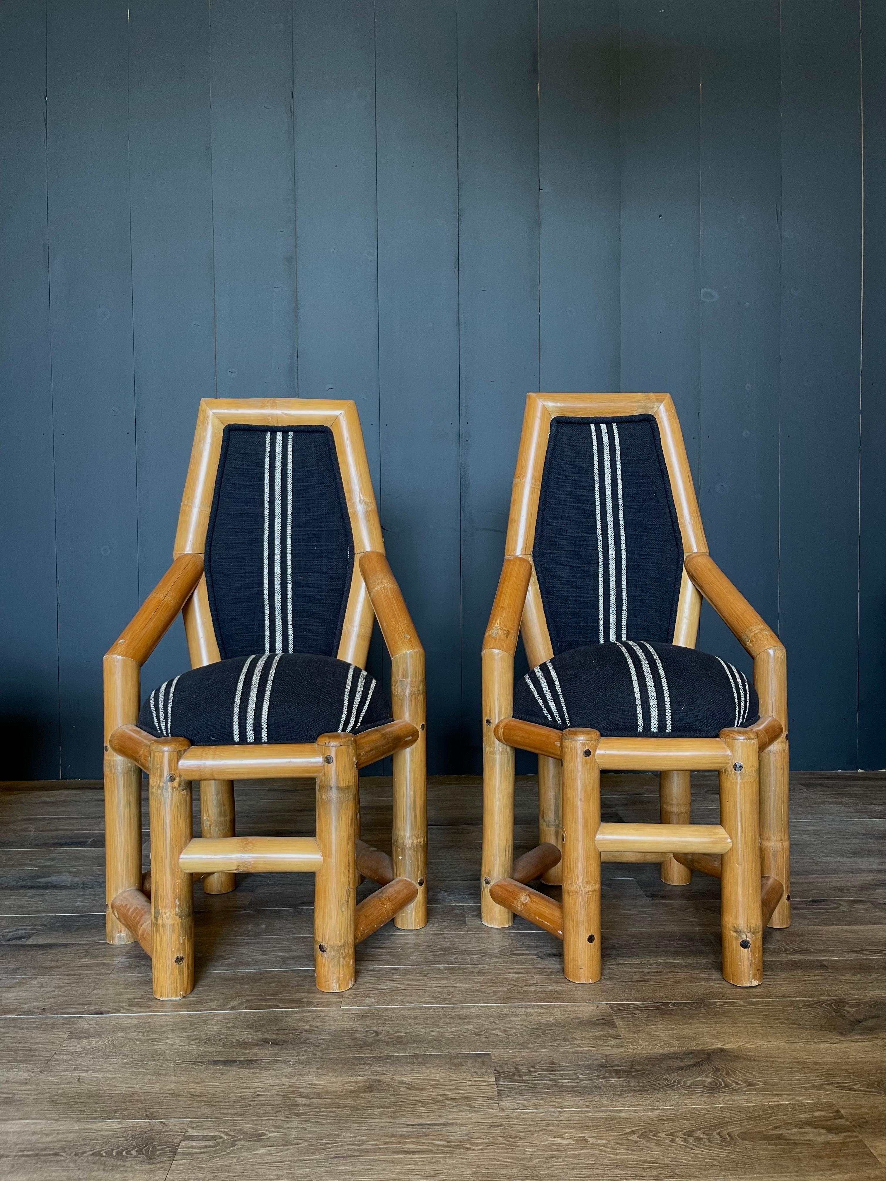 3 pairs available…Transform your space with this delightful pair of vintage bamboo accent chairs featuring a chic black and white striped fabric. Crafted with timeless charm, these chairs effortlessly blend classic bamboo craftsmanship with a
