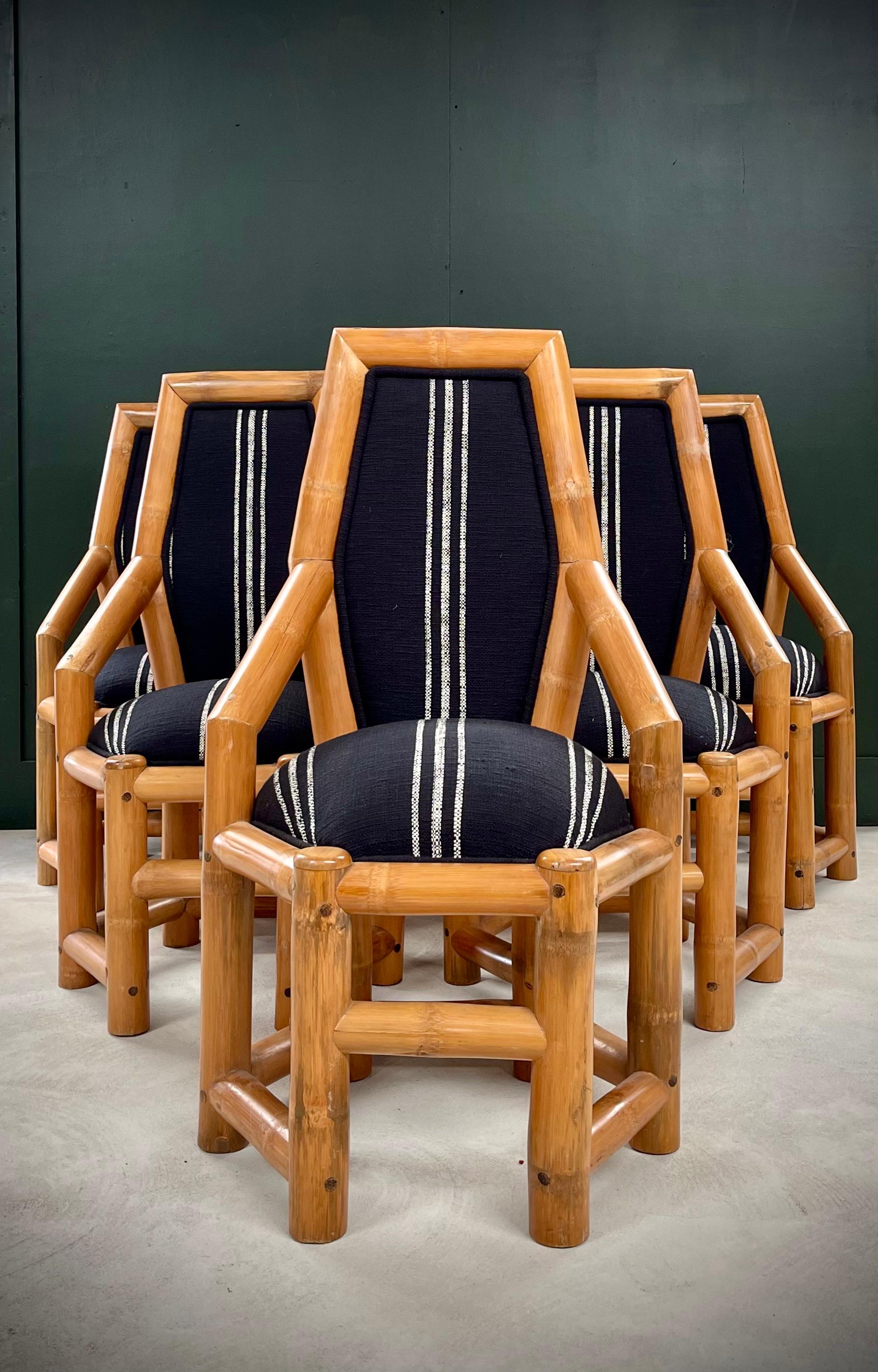 Elevate your dining space with this set of six postmodern oversized chunky bamboo chairs, freshly upholstered for a contemporary twist. Embracing bold lines and organic textures, these chairs make a striking statement with their unique silhouette