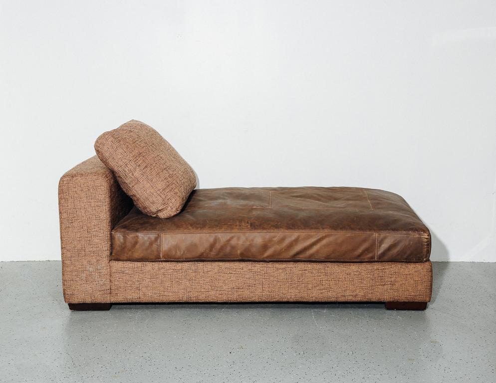Chunky patchwork leather and fabric chaise with matching fabric pillow. Measure: 16