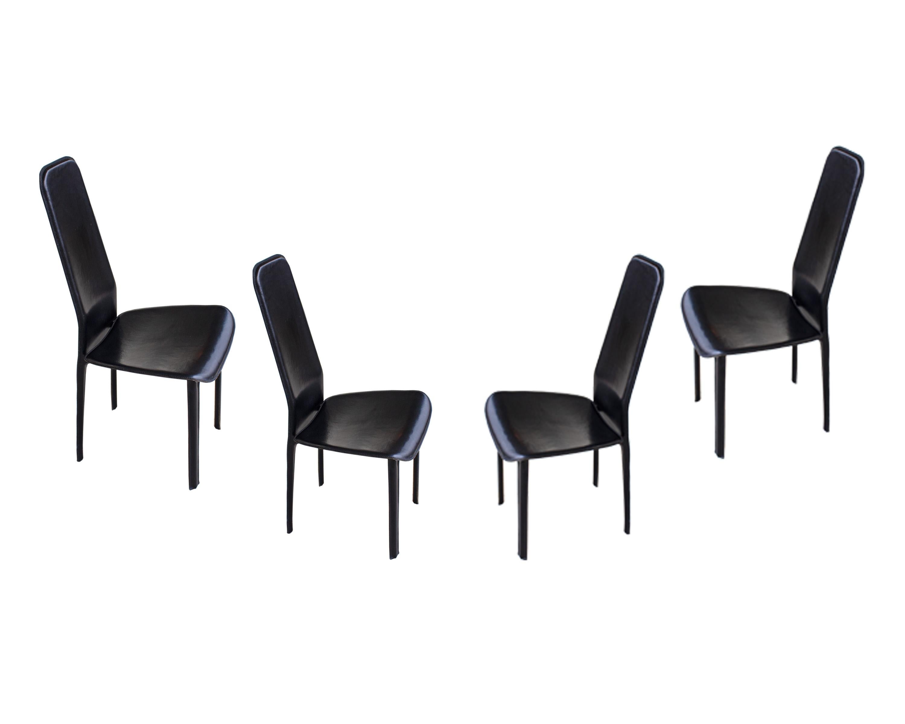 A set of four Italian Postmodern Cidue Elementi d'Arredo black leather chairs. The chairs are composed of metal frames and are covered in black leather that creates an overall sleek design. The original 