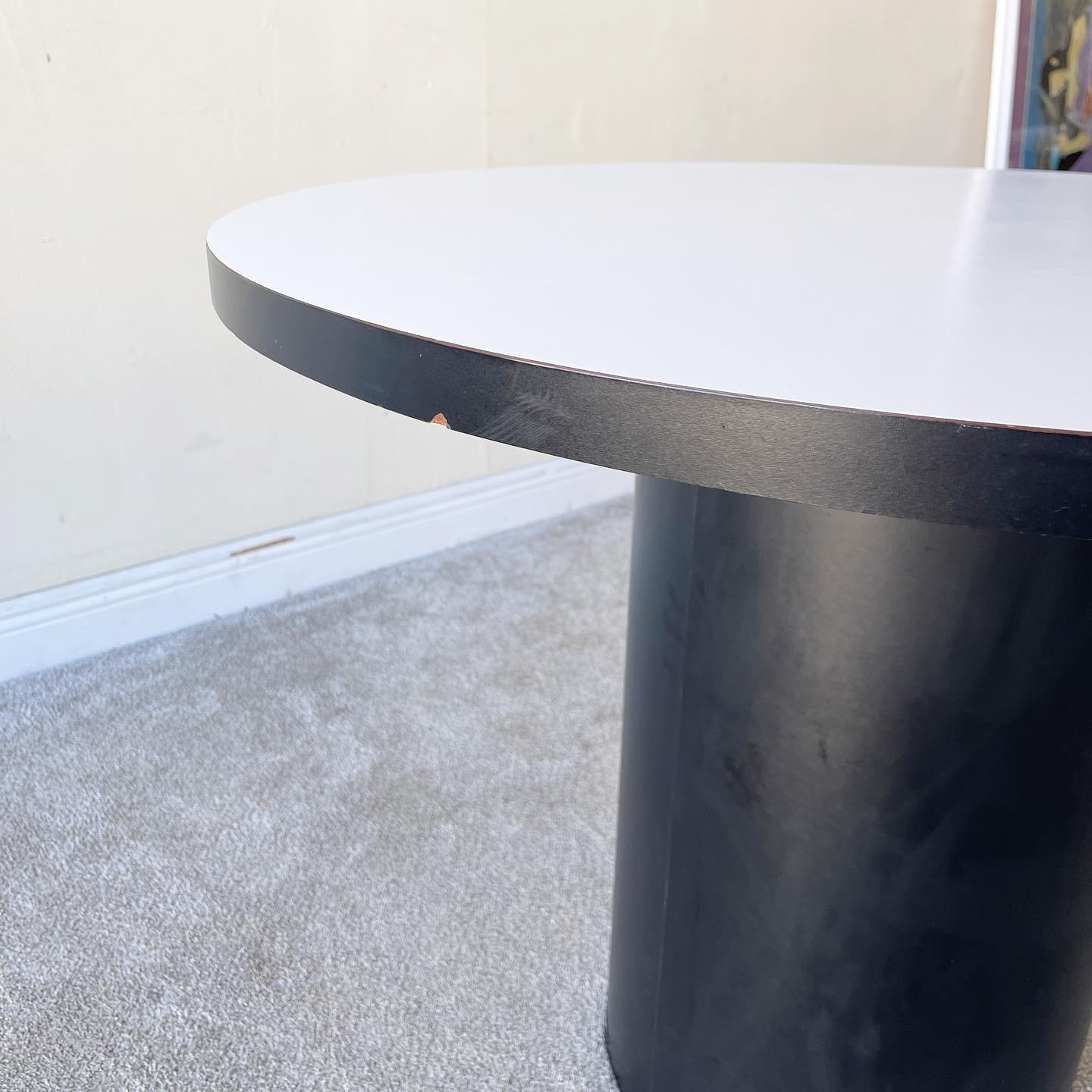 Postmodern Circular Black & White Laminate Dining Table In Good Condition In Delray Beach, FL