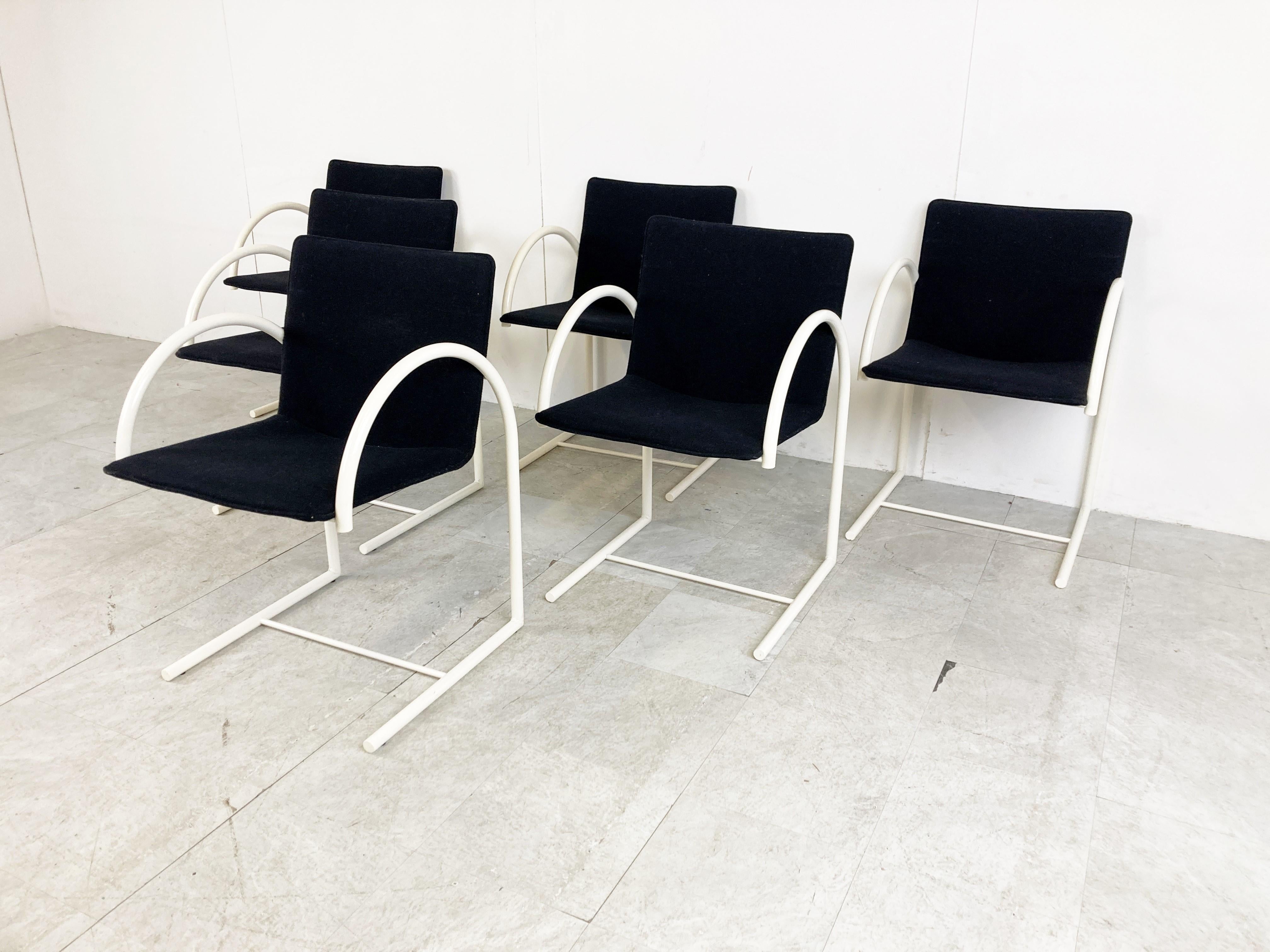 Post modern 'cirkel' dining chairs designed by Karel Boonzaaijer & Pierre Mazairac for Metaform.

Made out white lacquered metal tubular frames and black fabric.

Attractive, timeless design 

Good condition

1980s - Italy

Dimensions:
Height: