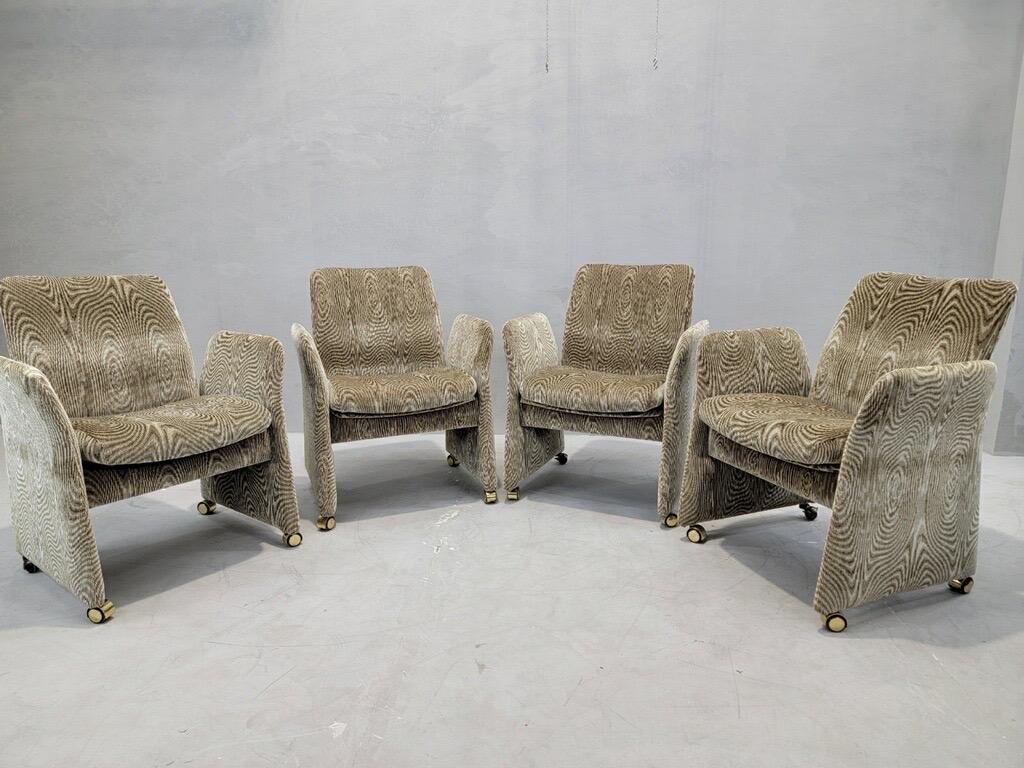 Vintage Postmodern Tilting Club Chairs By Chromcraft Newly Upholstered in a Retro Gold Patterned Chenille 

Featuring Postmodern tilting arm chairs by Chromcraft on casters. Tilting function and padded seat cushions provide tremendous comfort as