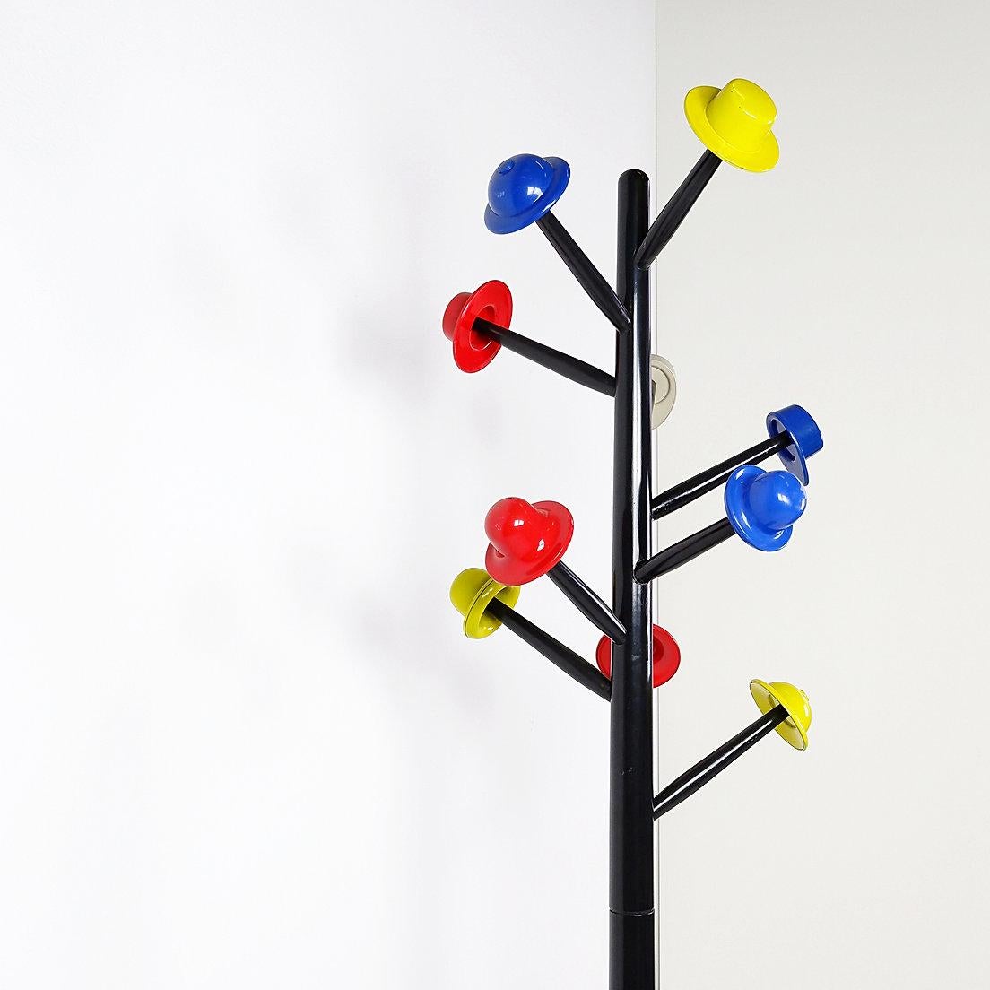 Postmodern coat stand 'Albero dei Cappelli' by Ugo Nespolo for Origlia, 1978
Italian Coat Stand
Measures : Ø base 37cm -  H: 186cm
Materials : wood - metal - plastic 
Wear Consistent with age and use : a reglue 