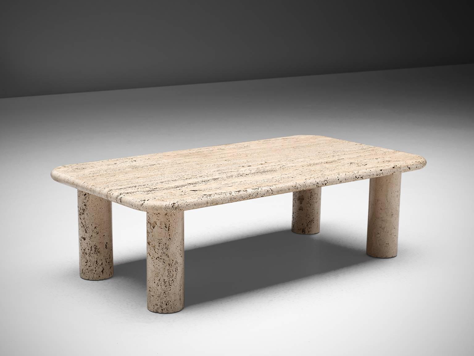 Side table, travertine, Italy, 1970s.

This sculptural is a typical example of postmodern design. The cocktail table is executed in travertine by means of which a warm, natural yet monumental look is created. The thick, soft-edged rectangular top
