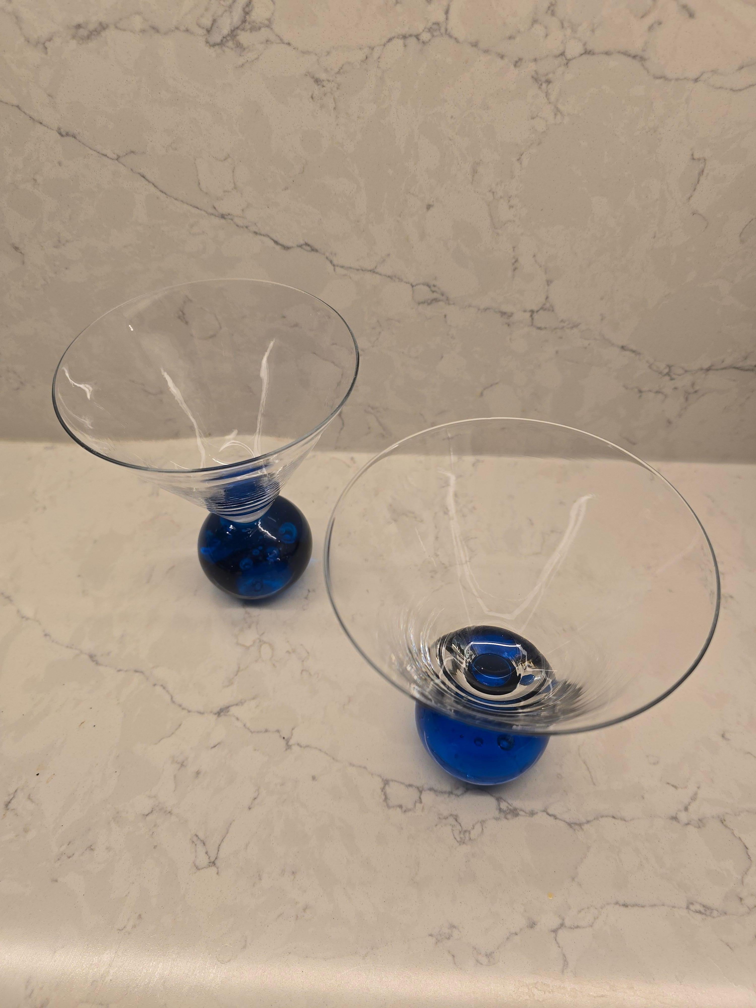 Super cool postmodern cocktail Glasses that can be used for martinis, cosmos, and other cocktails. This Memphis style glasses feature a rounded cylindrical base with a wide open triangular top in the same shape as martini glass tops. The cylindrical