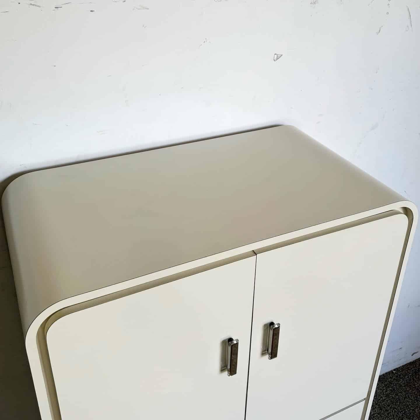 Late 20th Century Postmodern Cream Lacquer Laminate Waterfall Armoire