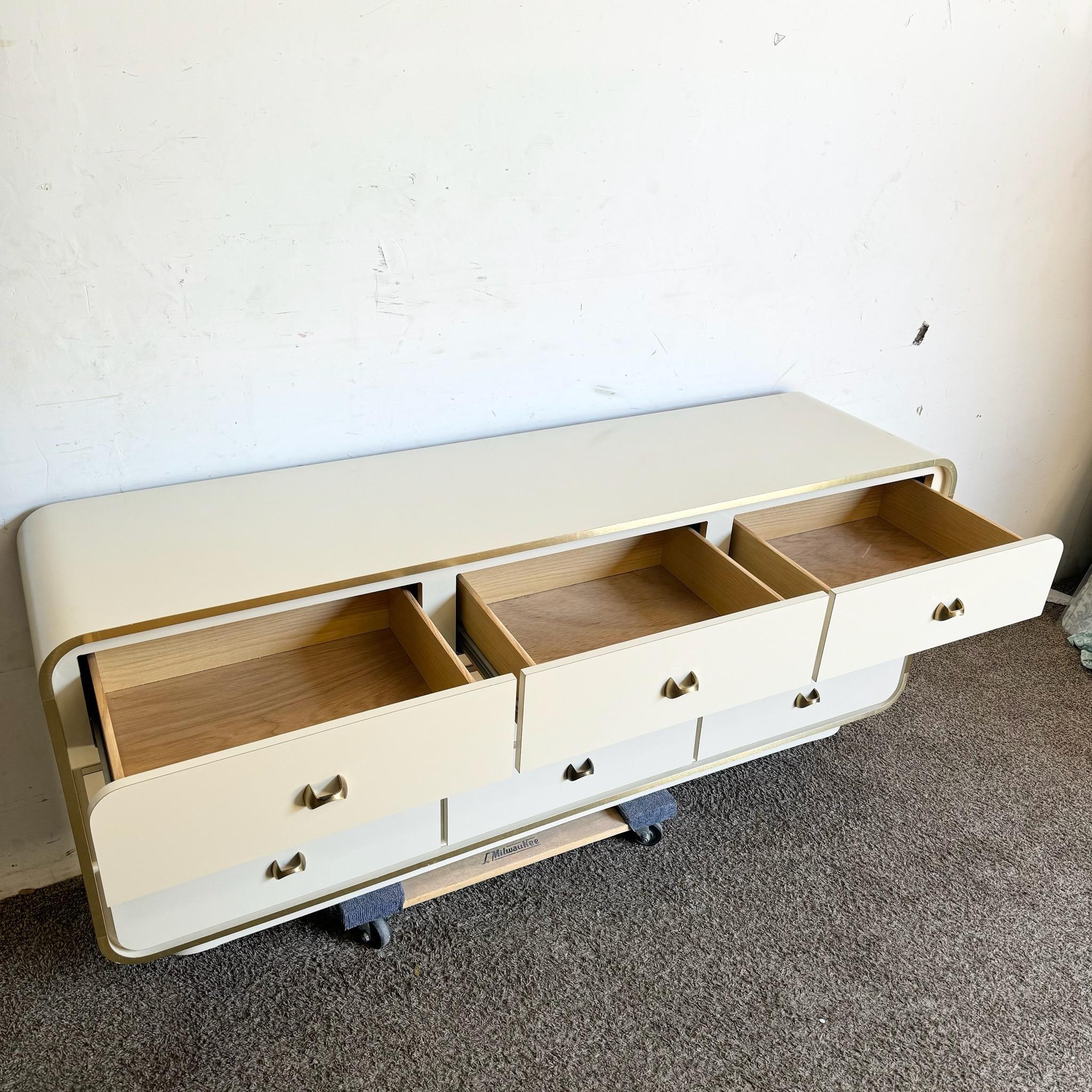 Postmodern Cream Lacquer Laminate Waterfall Dresser With Gold Accents 4